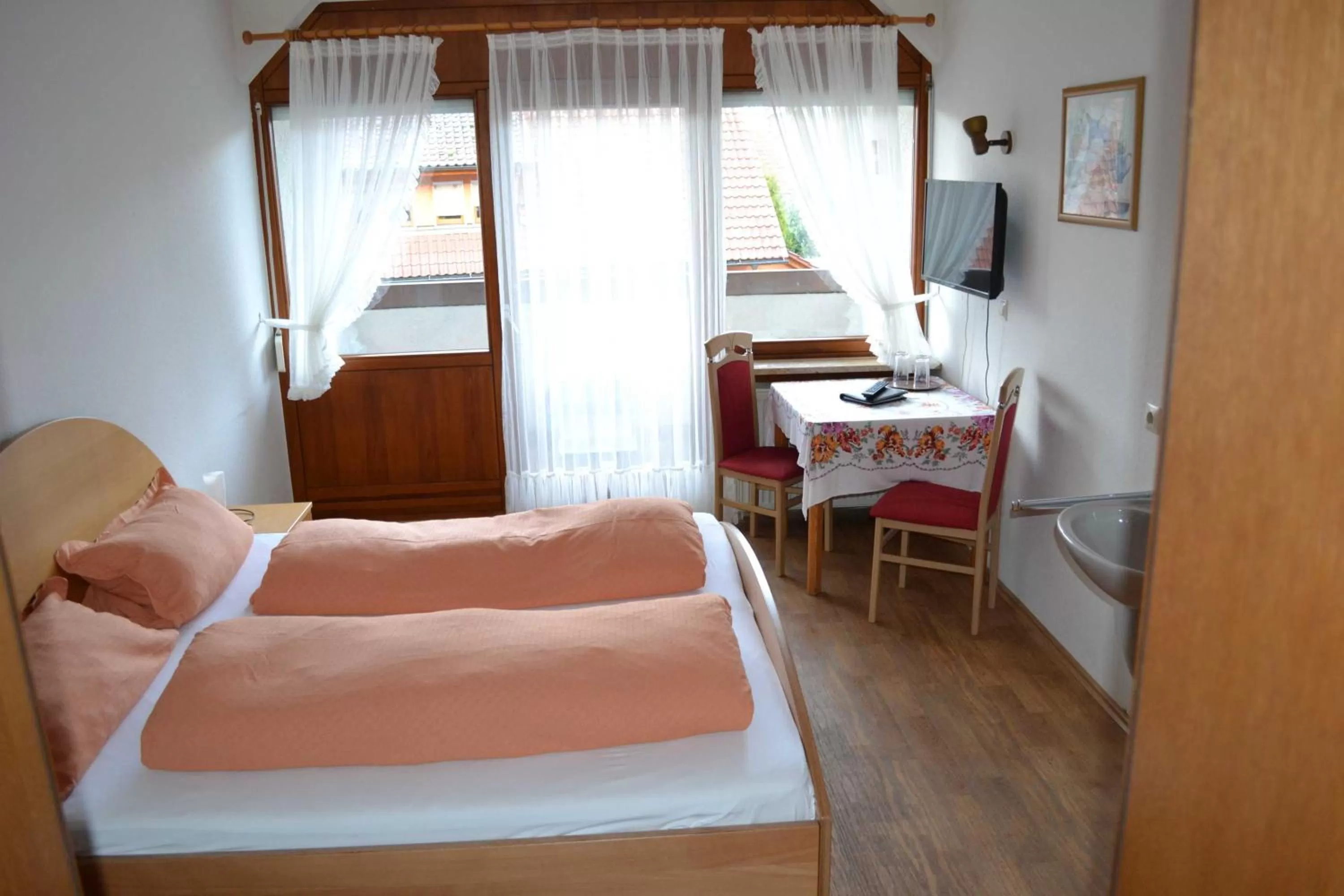 Photo of the whole room, Bed in Gaestehaus Tagescafe Eckenfels