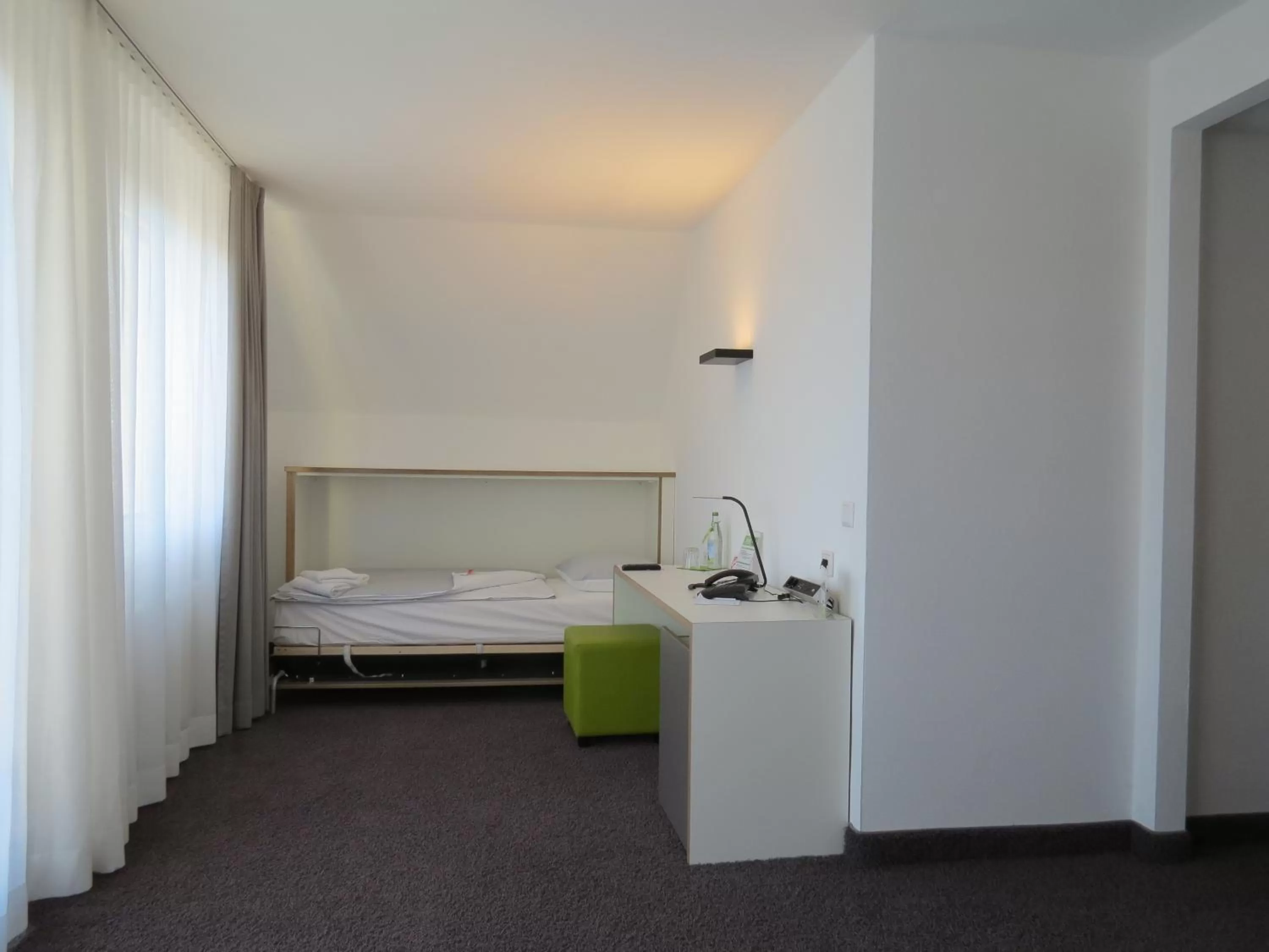Bed in Comfor Hotel Ulm City