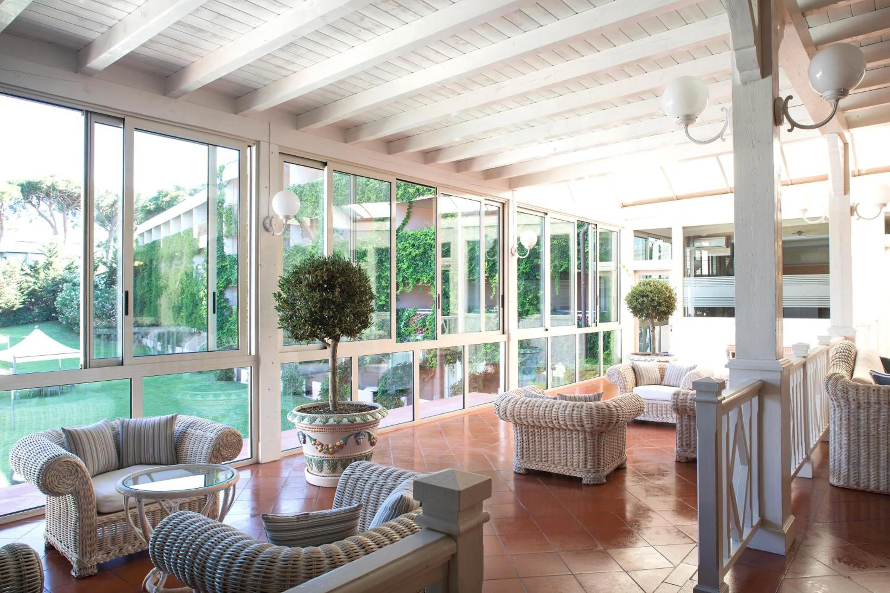 Communal lounge/ TV room in Golf Hotel Punta Ala