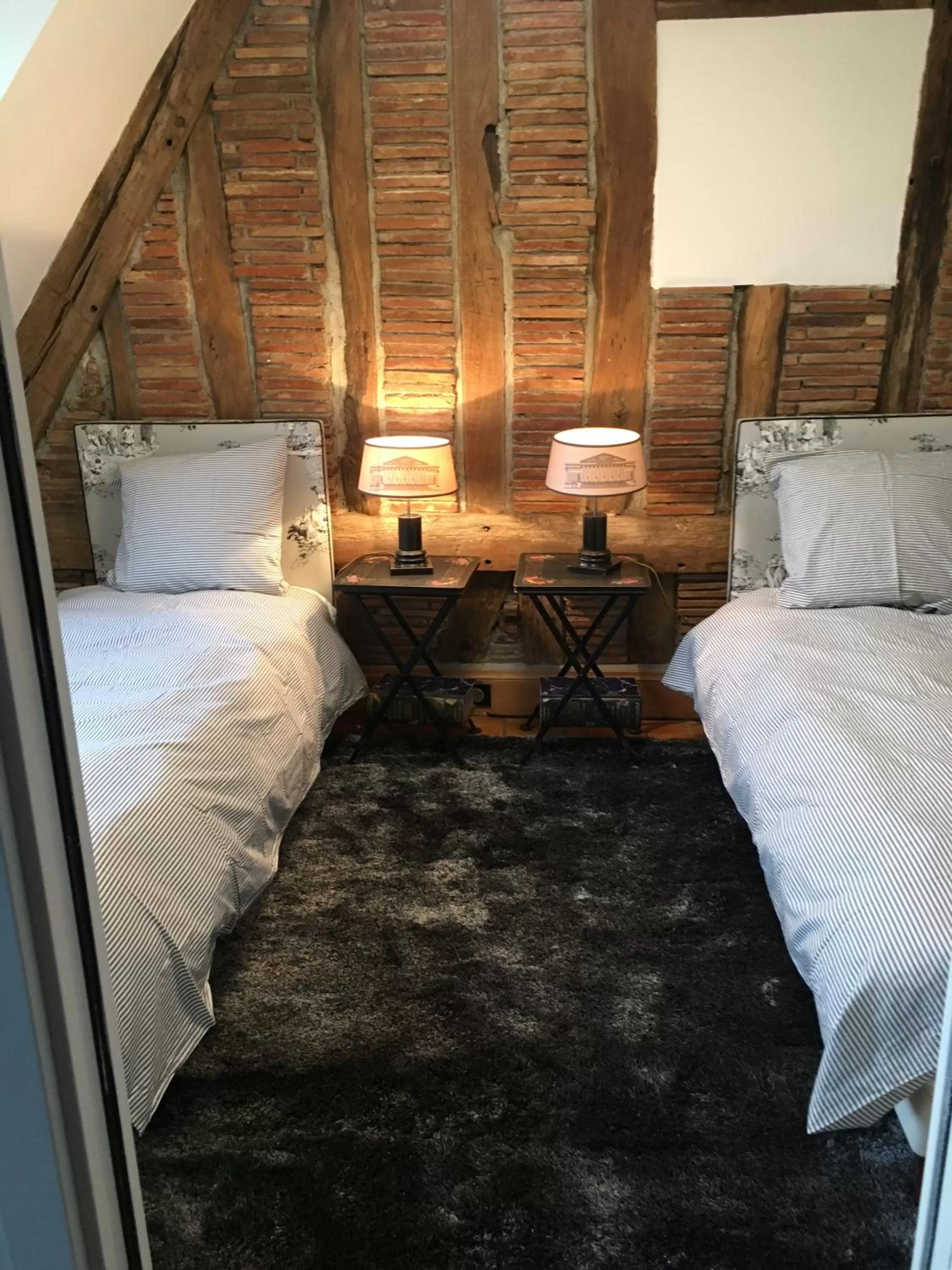 Bed in Demeure des Vieux Bains