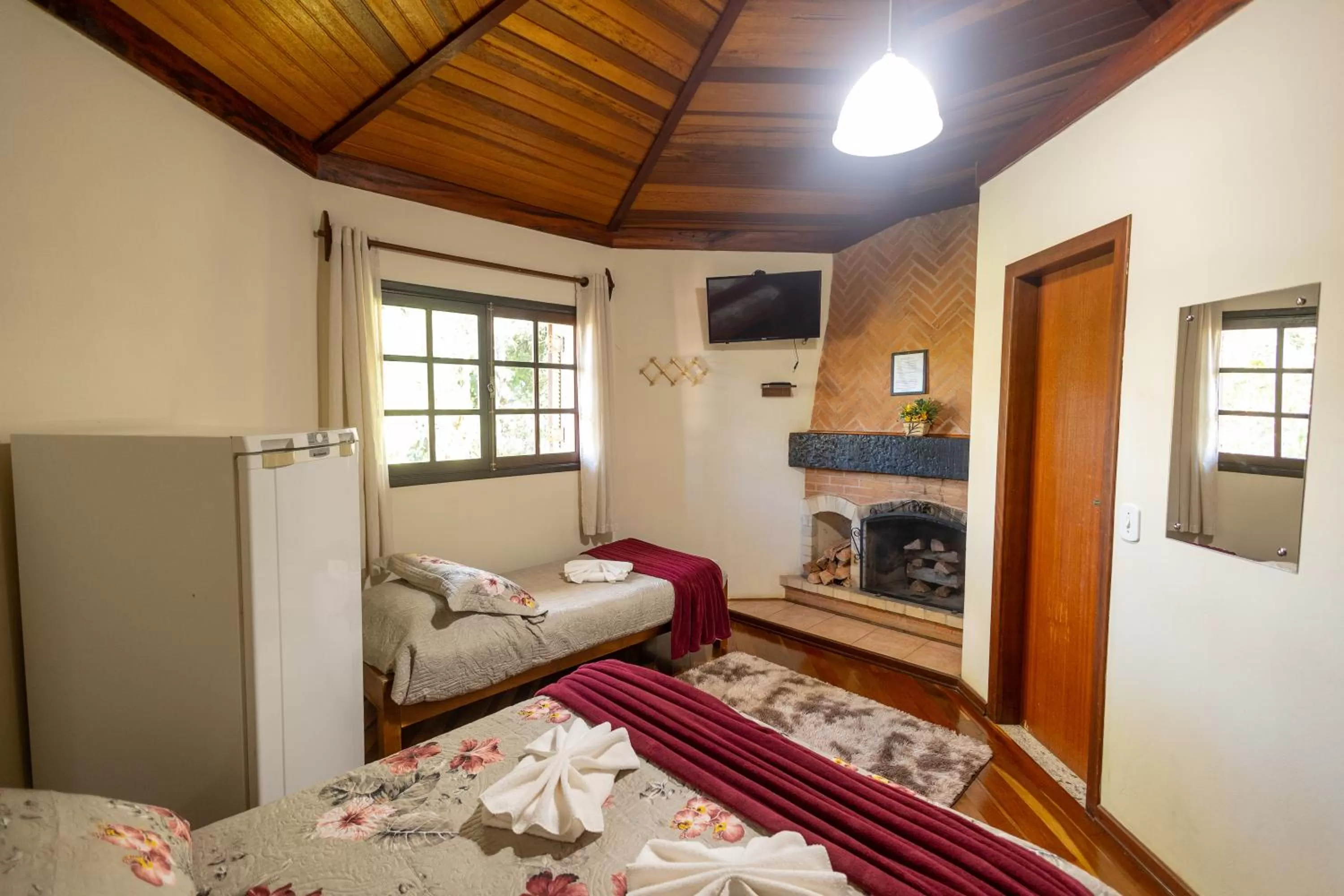 Bed in Chalés 3 Pinheiros