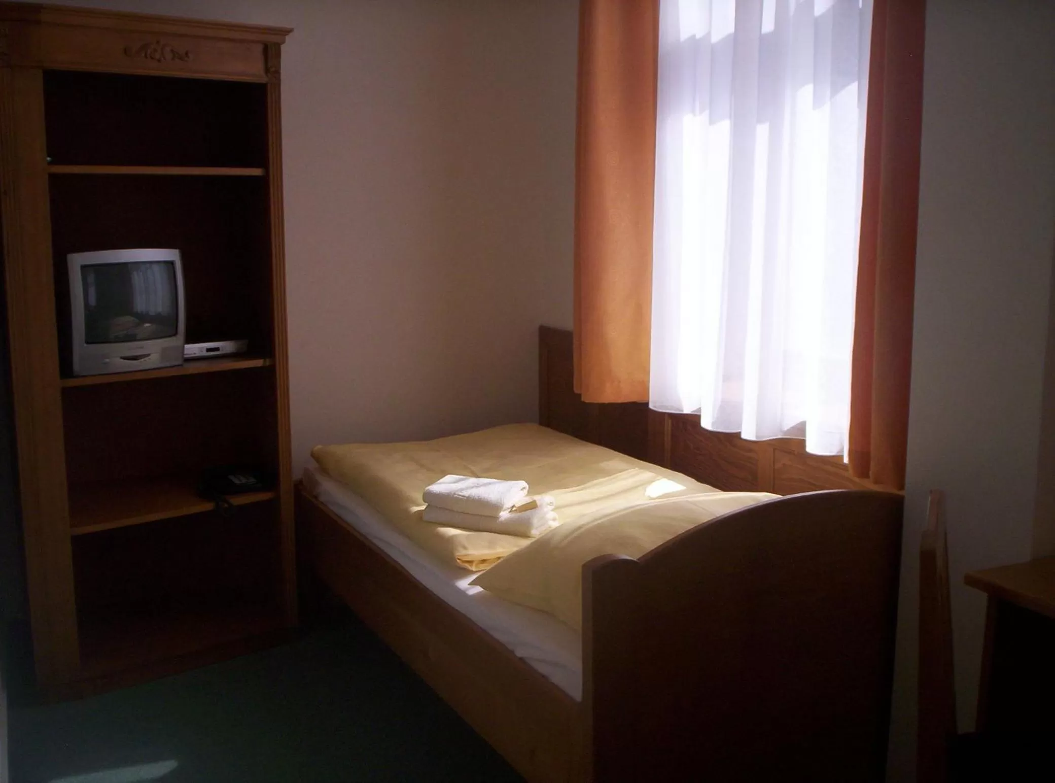 Bed in Hotel Krakonoš