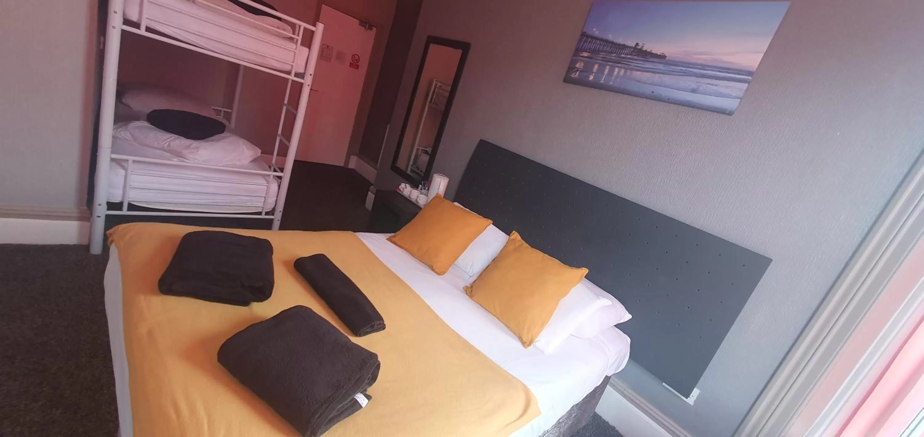 Bed in Palm Beach Hotel by the Sea