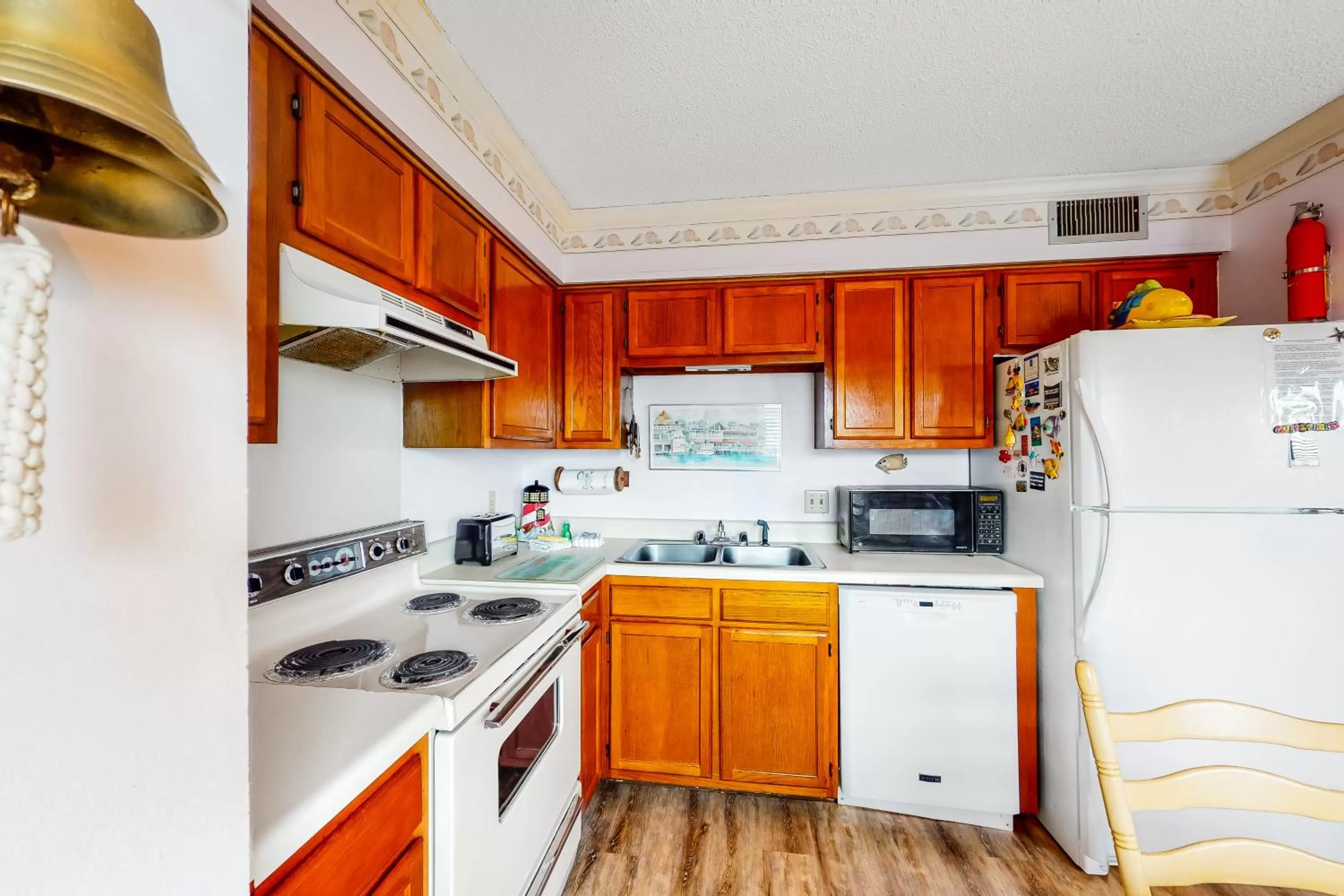 Kitchen/Kitchenette in Beach Front #203