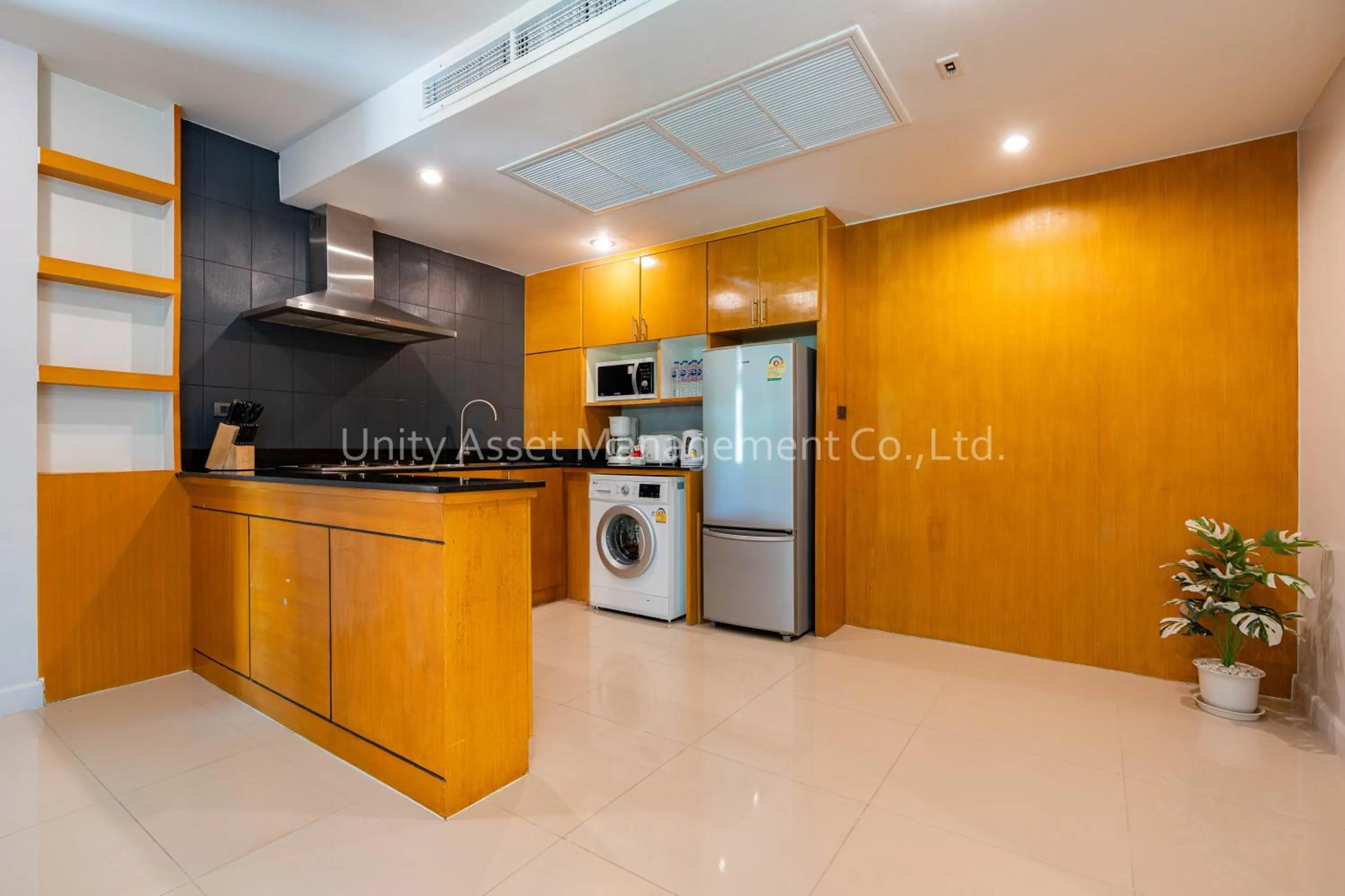 Kitchen or kitchenette in The Unity and The Bliss Patong Residence