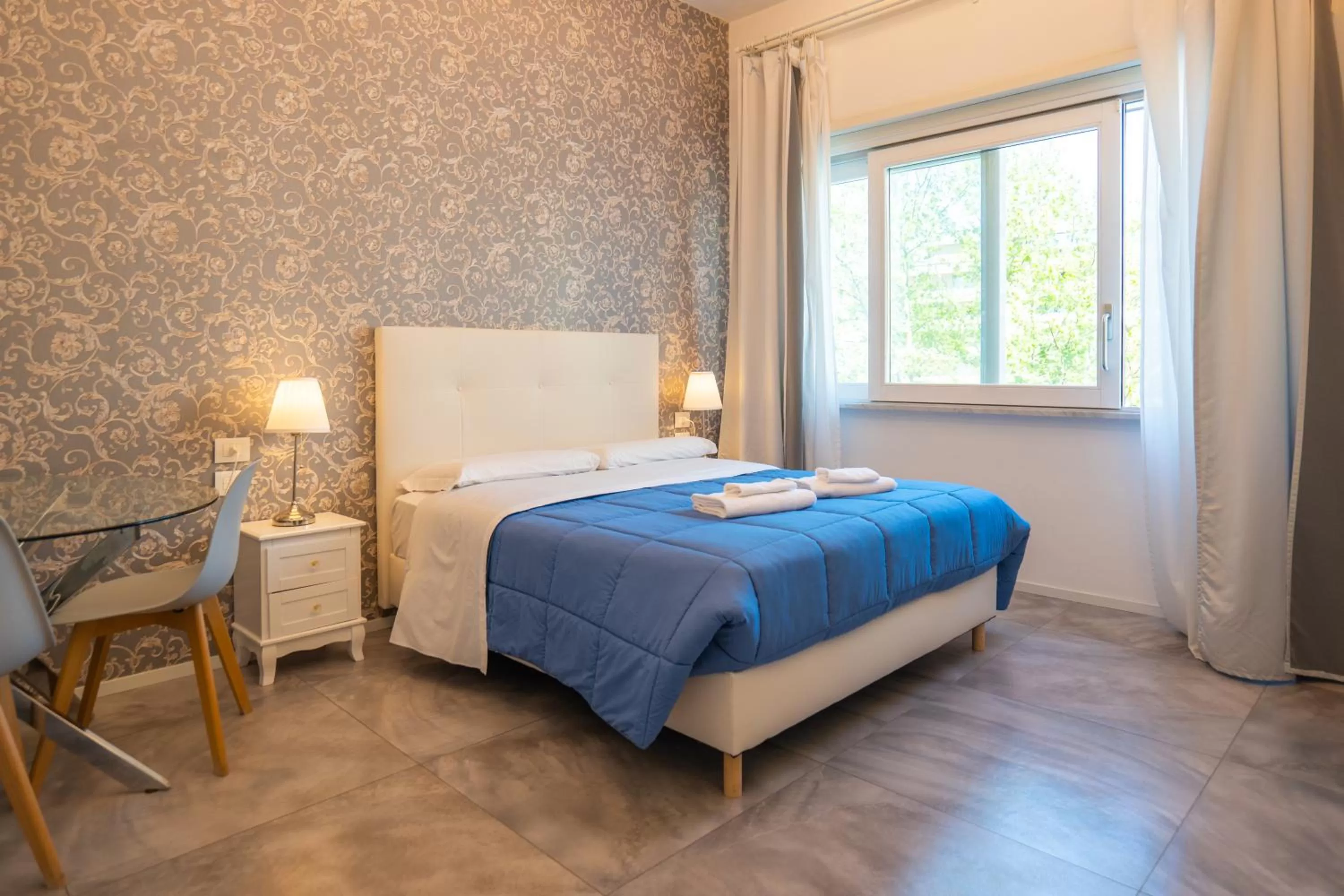 Bed in Relais Vittorio Veneto - Luxotel & Apartotel