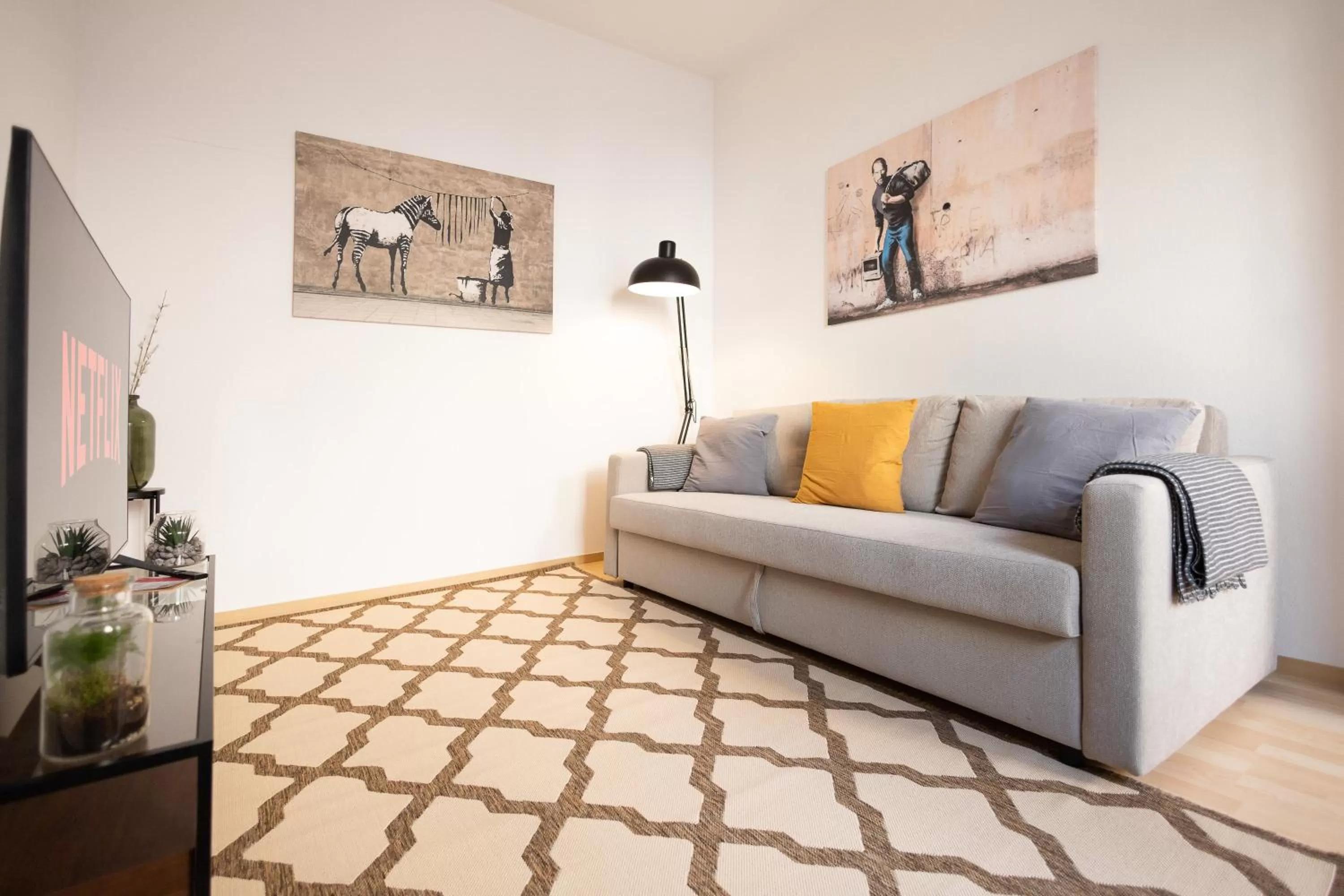 Seating Area in Ko-Living Space an der Oper - Street Art Design Apartments