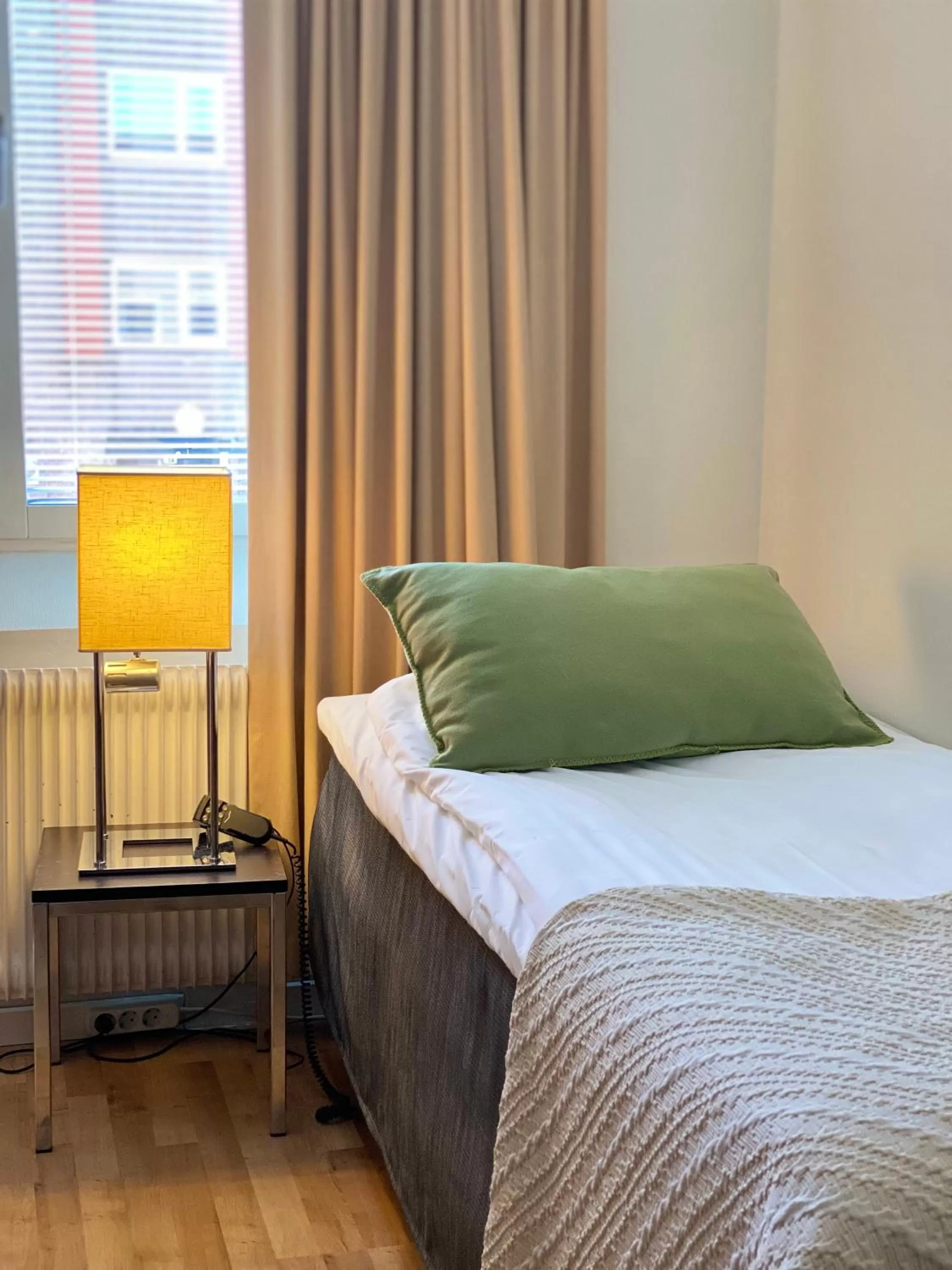 Bed in Strand City Hotel