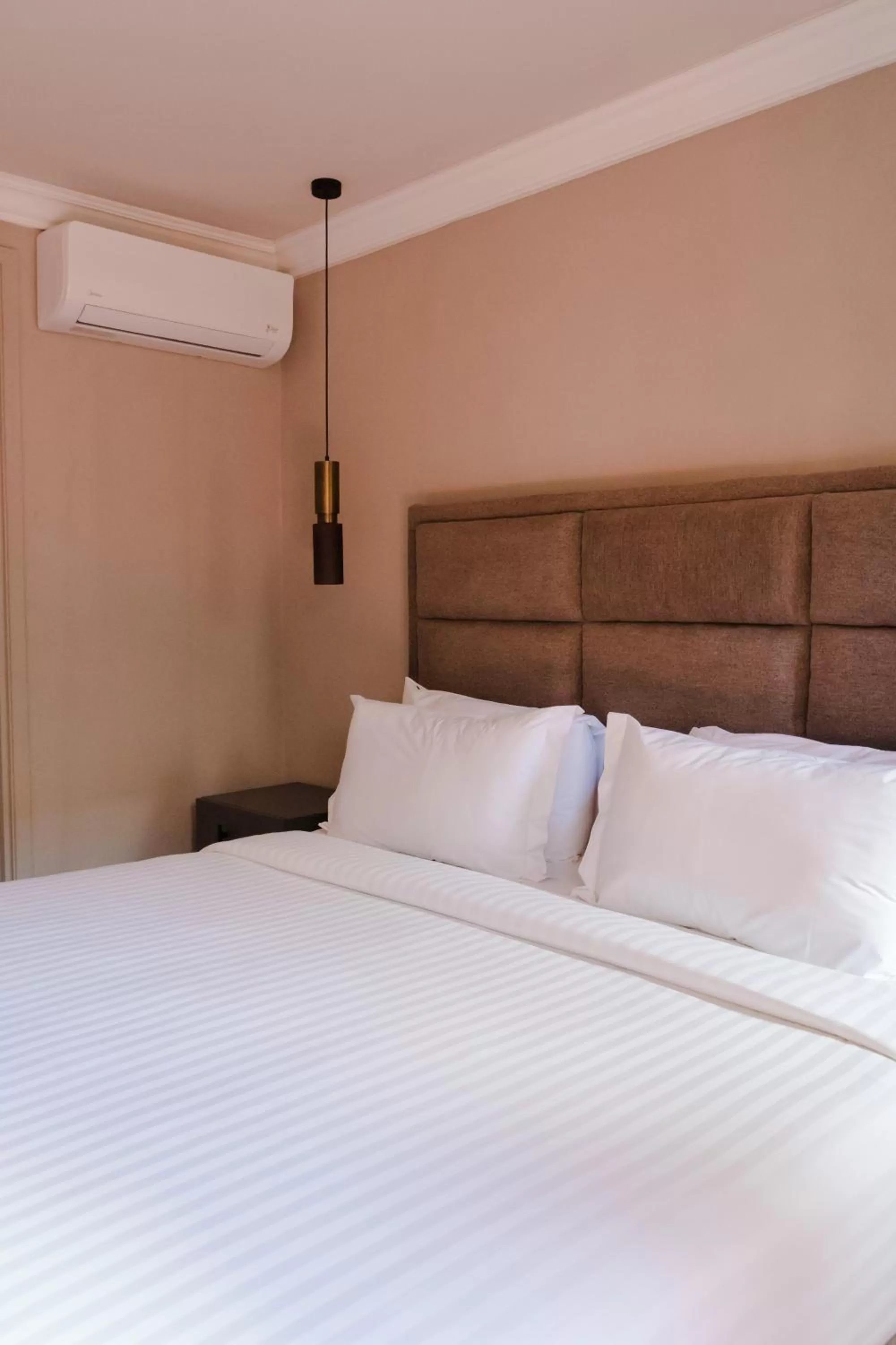 Bed in Mikaella Hotel