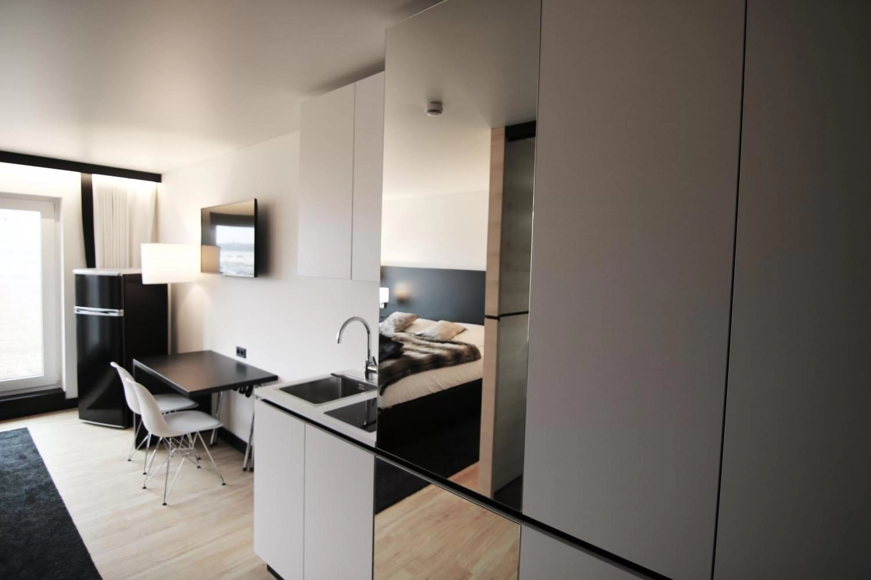 Decorative detail, TV/Entertainment Center in LH Hotel by WMM Hotels