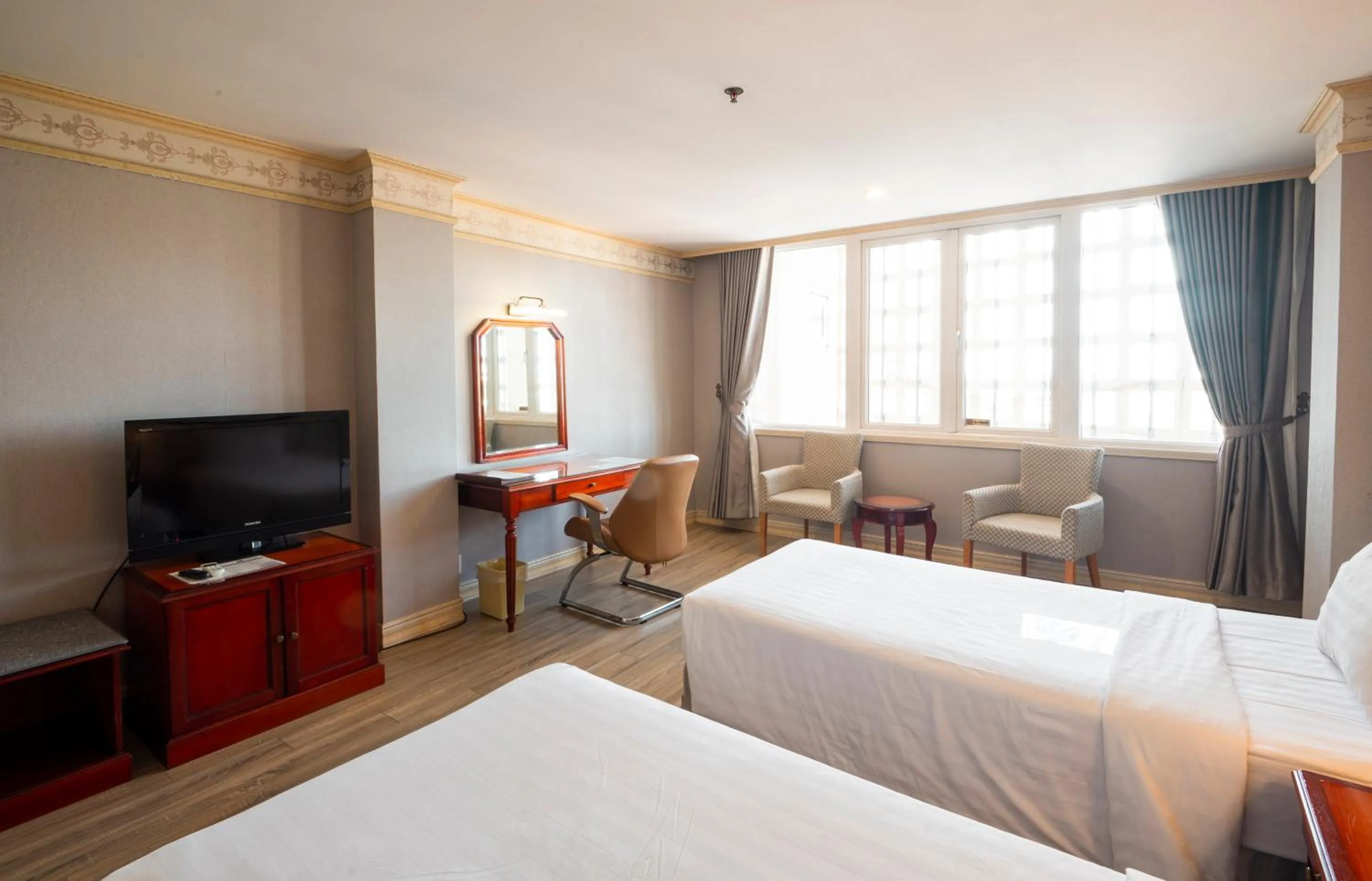 Photo of the whole room, Bed in Lotus Saigon Hotel