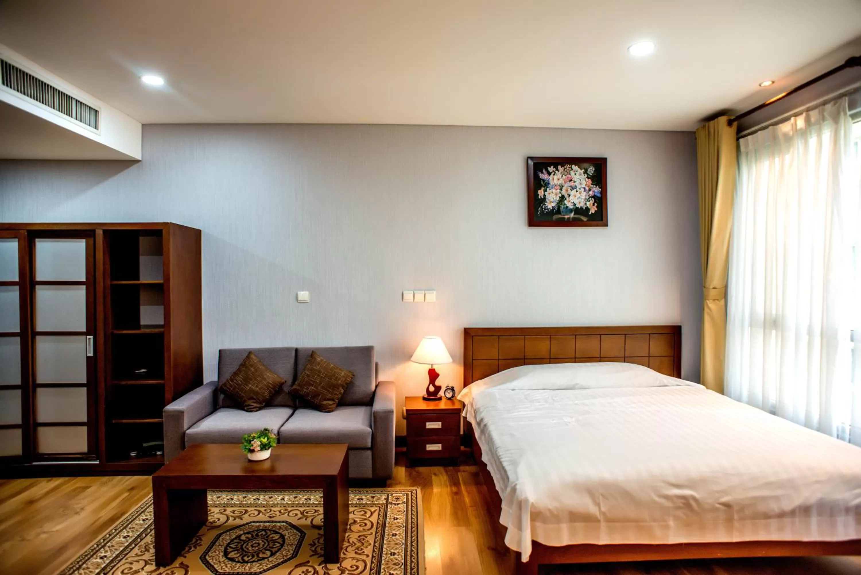 Photo of the whole room, Bed in Lancaster Ho Chi Minh Serviced Apartment Official