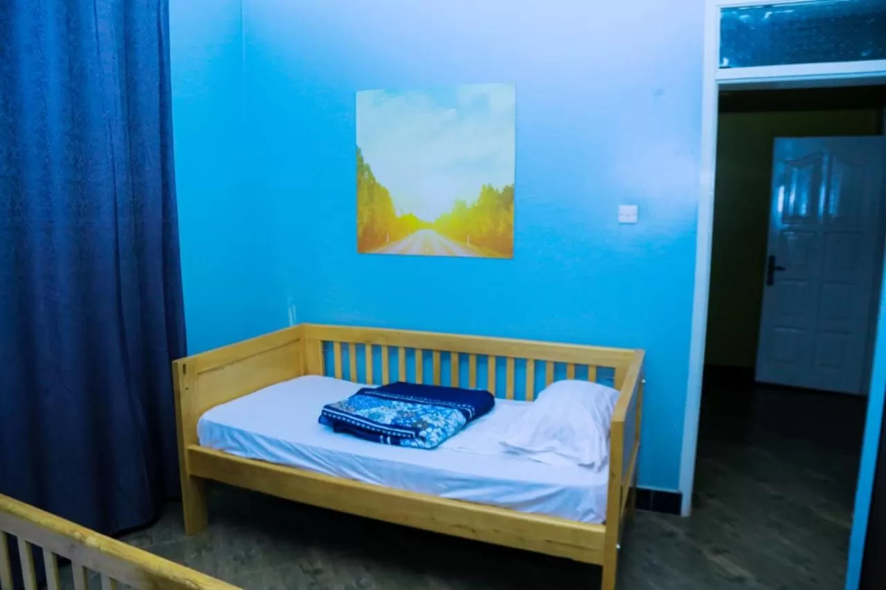 Bed in Karibu Namugongo