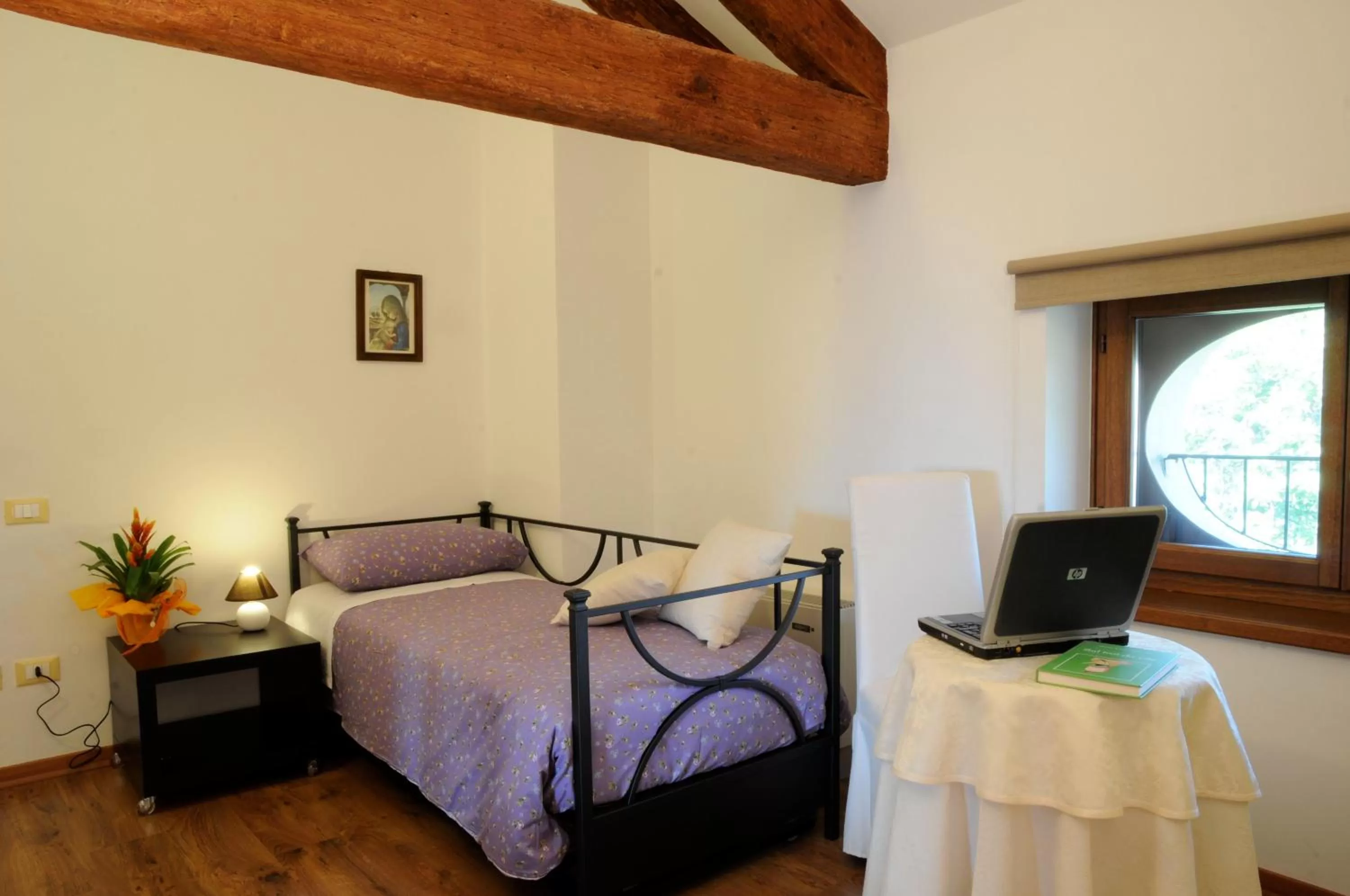 Bed, Seating Area in Casa Pellis