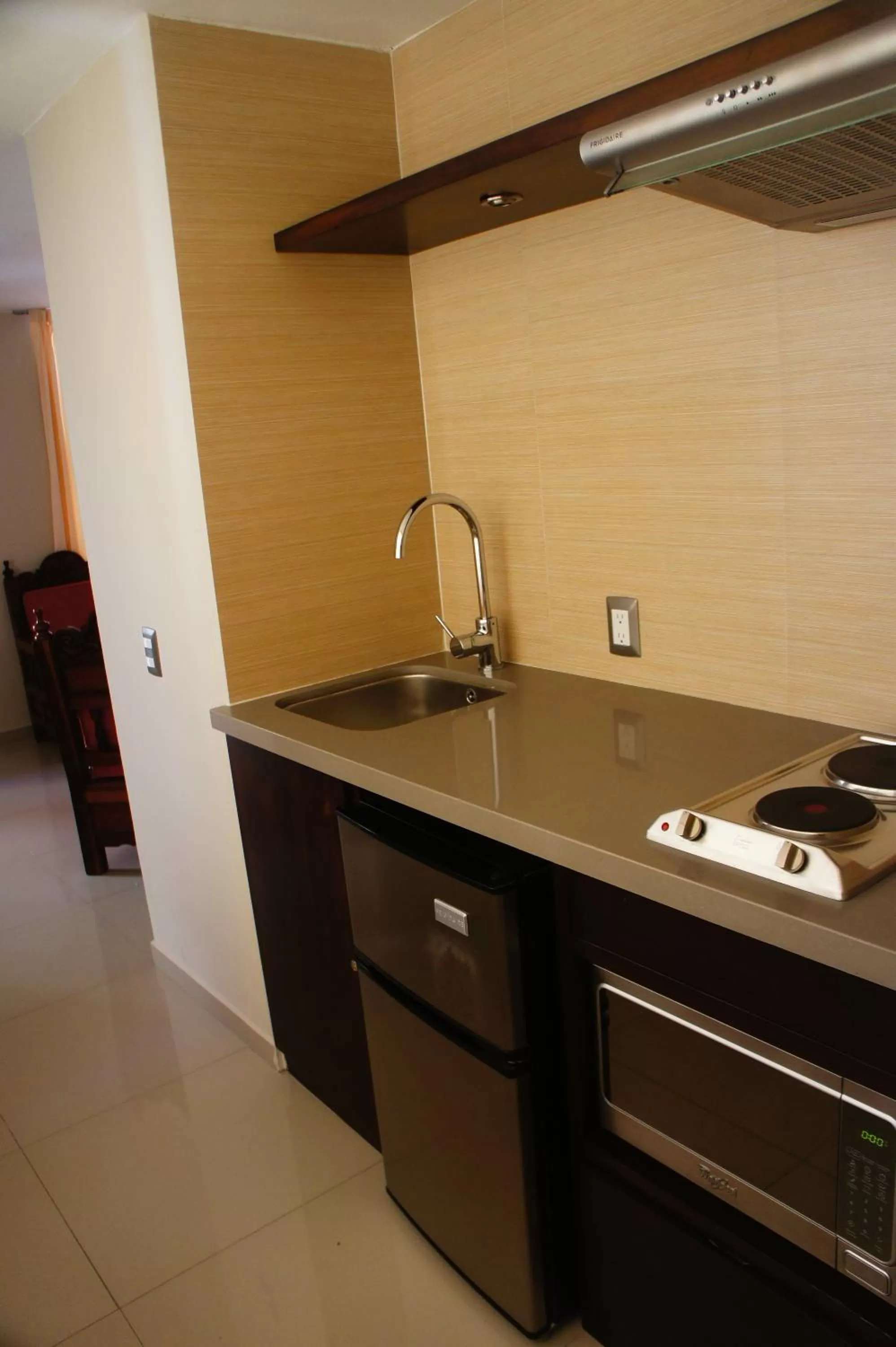 Kitchen or kitchenette in Suites San Luis