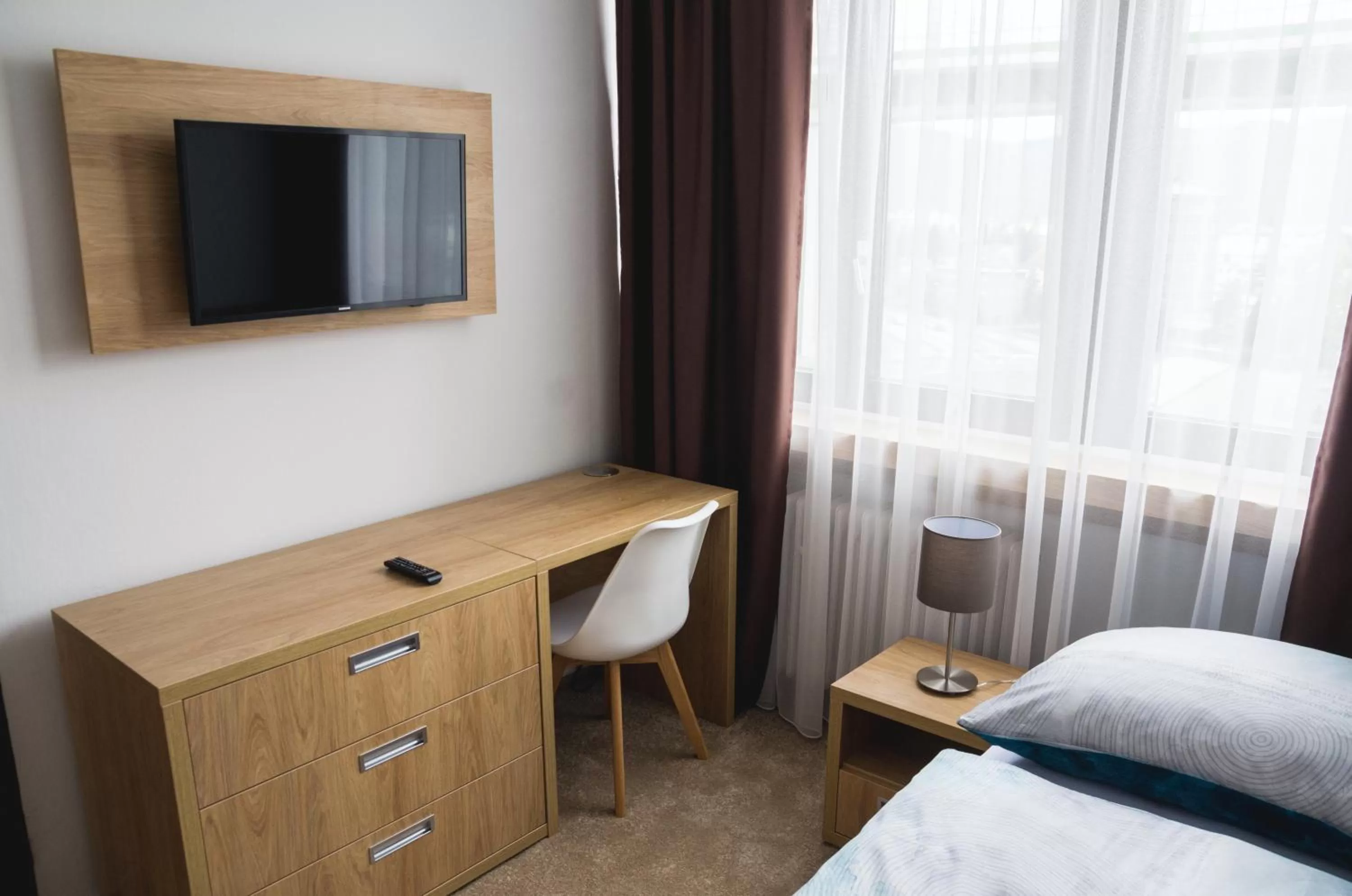 TV and multimedia, TV/Entertainment Center in Hotel Bothe