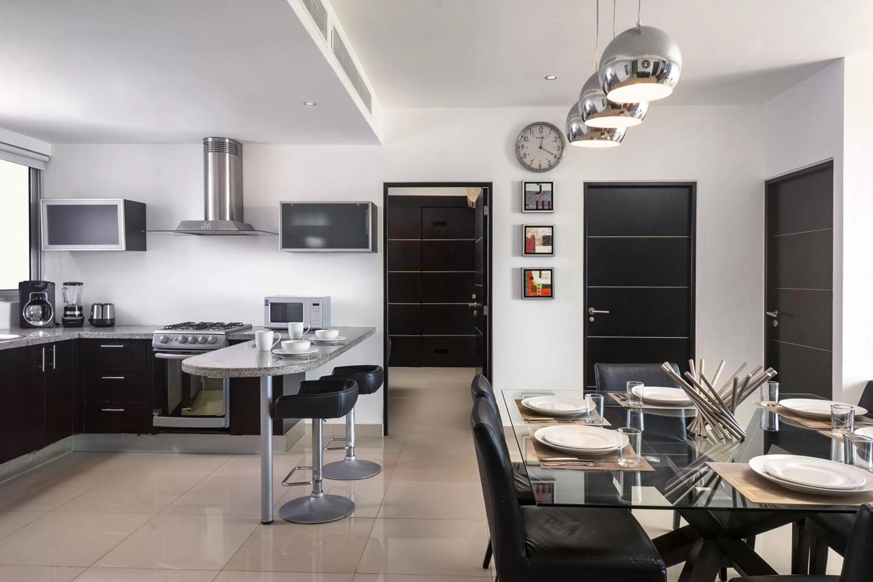 Kitchen or kitchenette in Suites Malecon Cancun