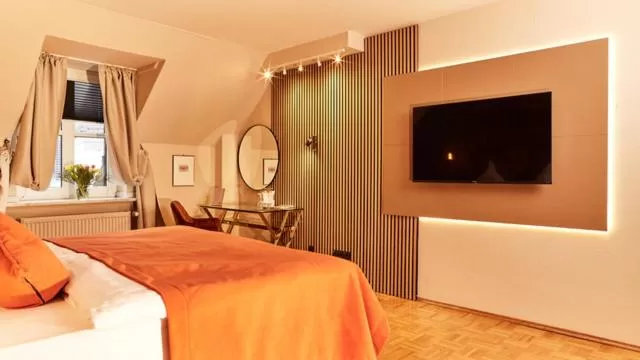 Living room, Bed in Hotel van Bebber