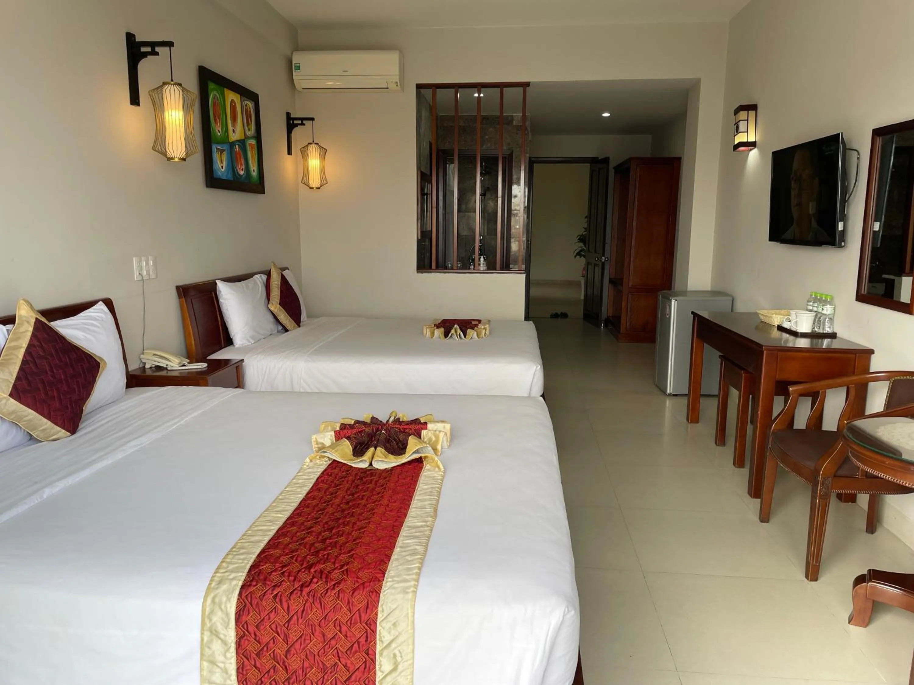 Bed in Sunshine Hoian Hotel