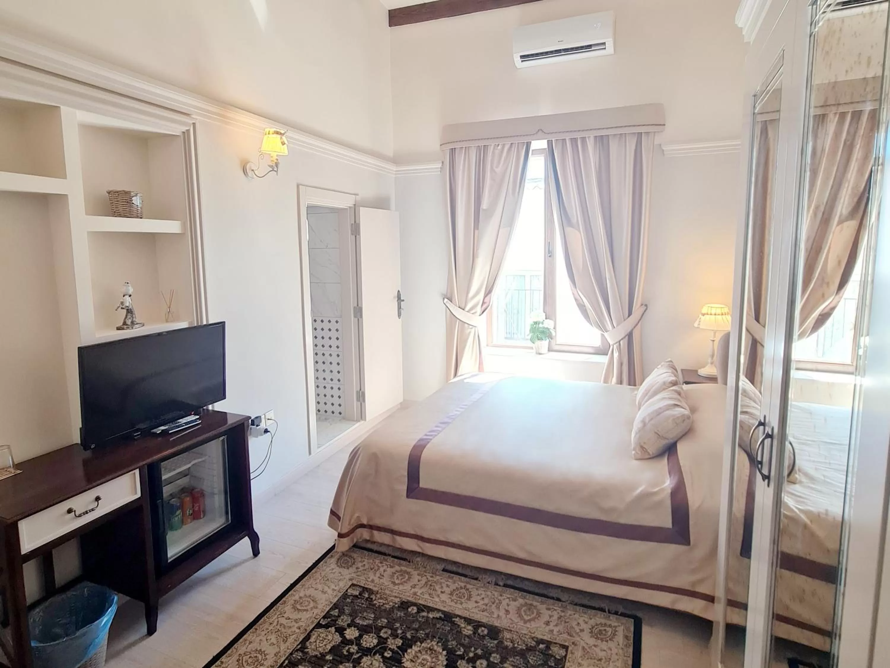 Bed in SOFIA BOUTIQUE HOTEL