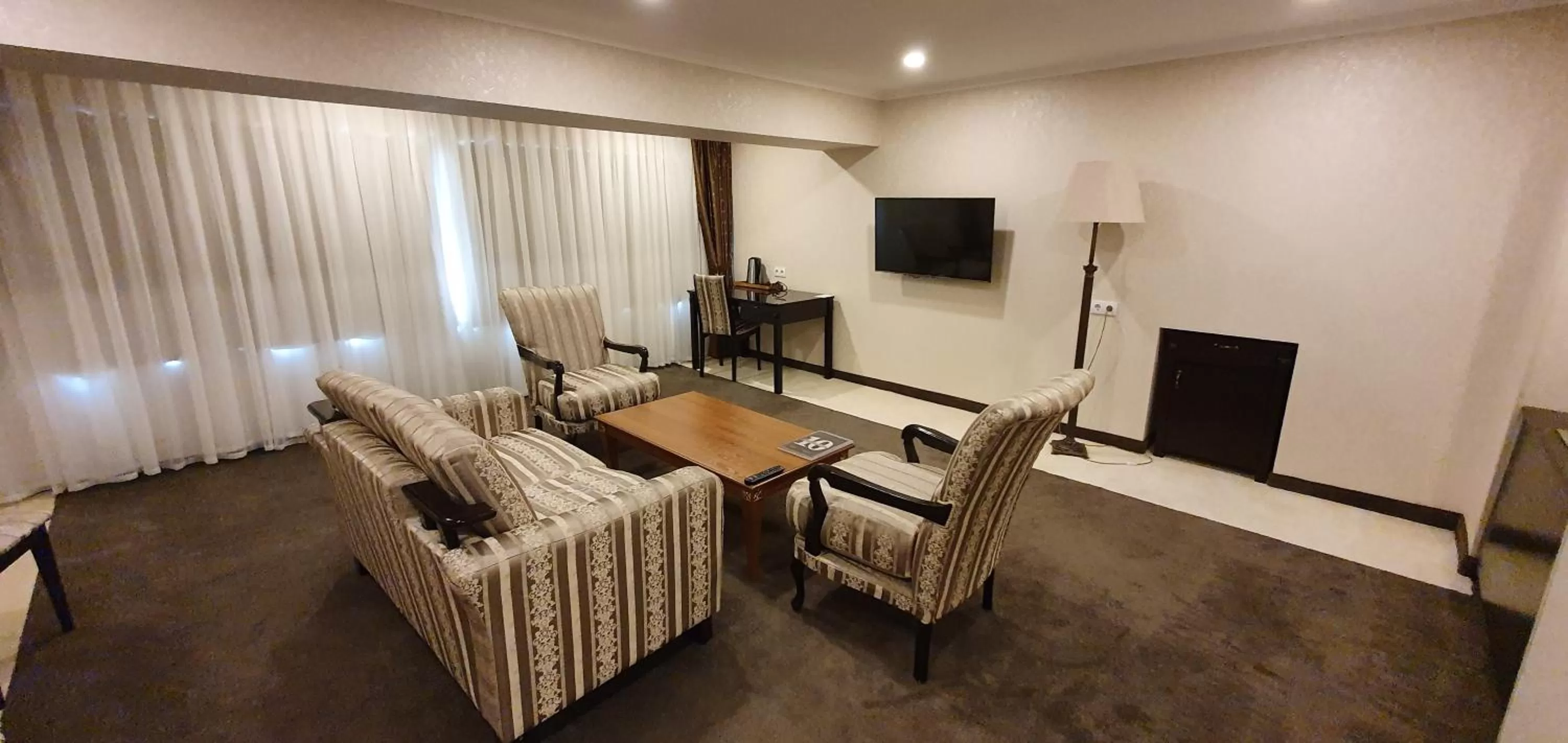 Seating area in Grand Mir Hotel