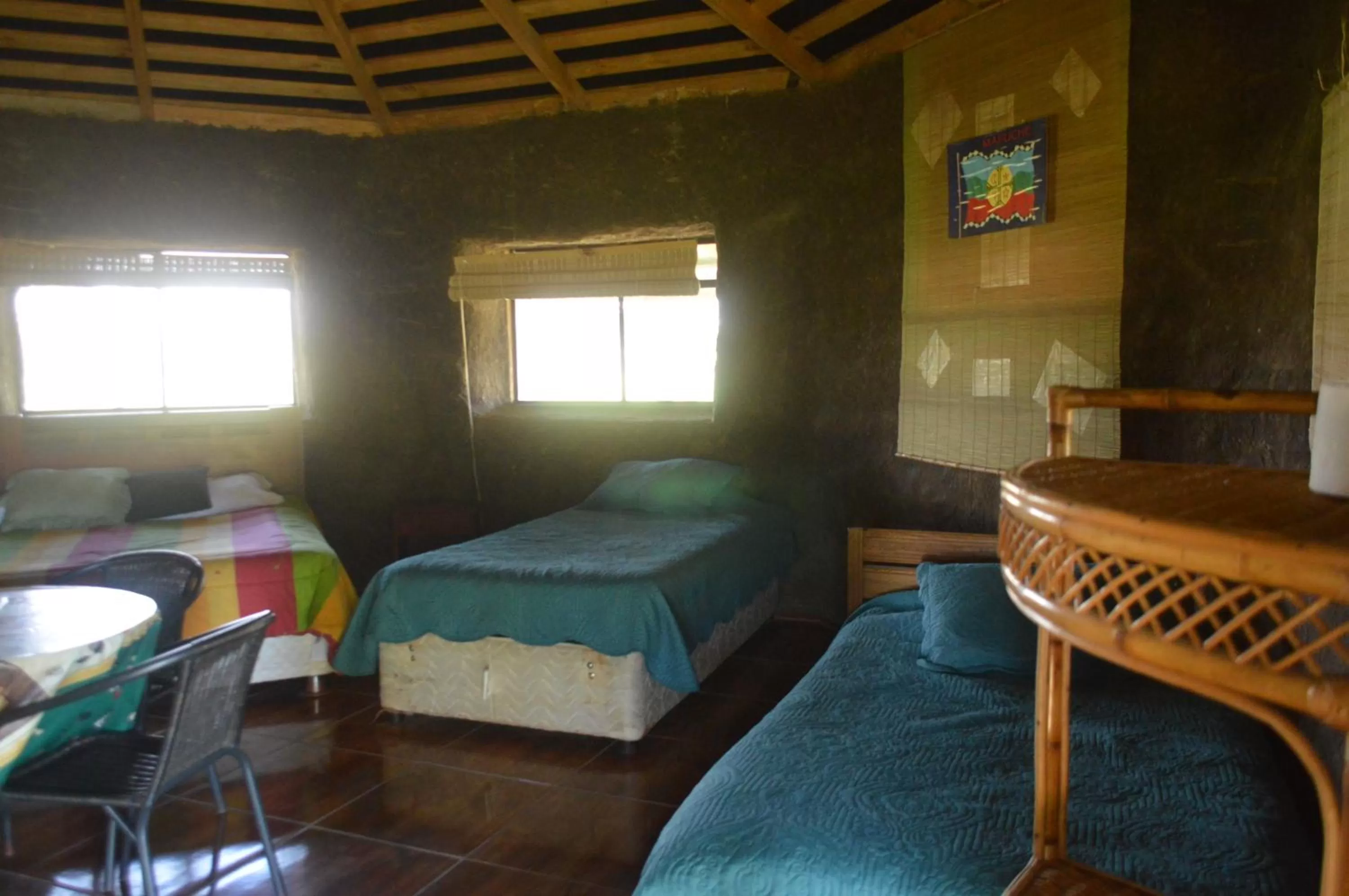 Bed in Coyunche Cabañas y Camping Laja & San Rosendo