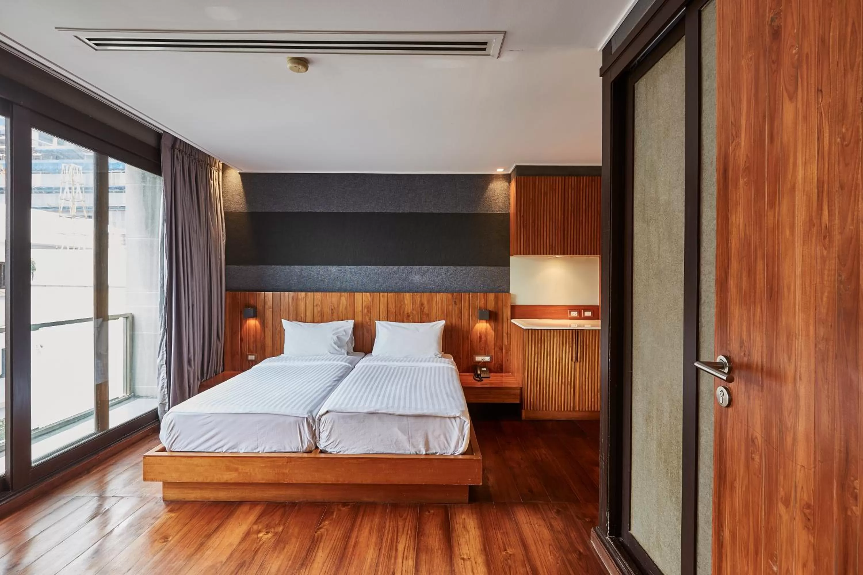 Bed in LUXX Langsuan Hotel - SHA Plus