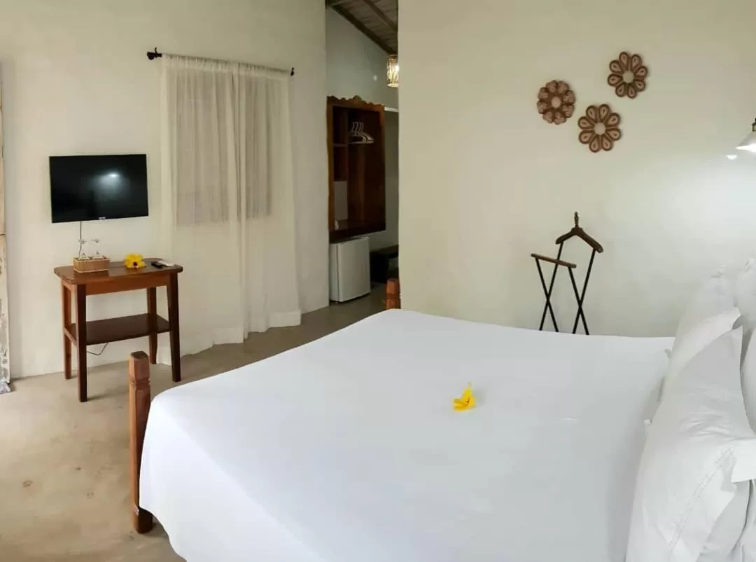Photo of the whole room, Bed in Pousada Villages Boutique Hotel