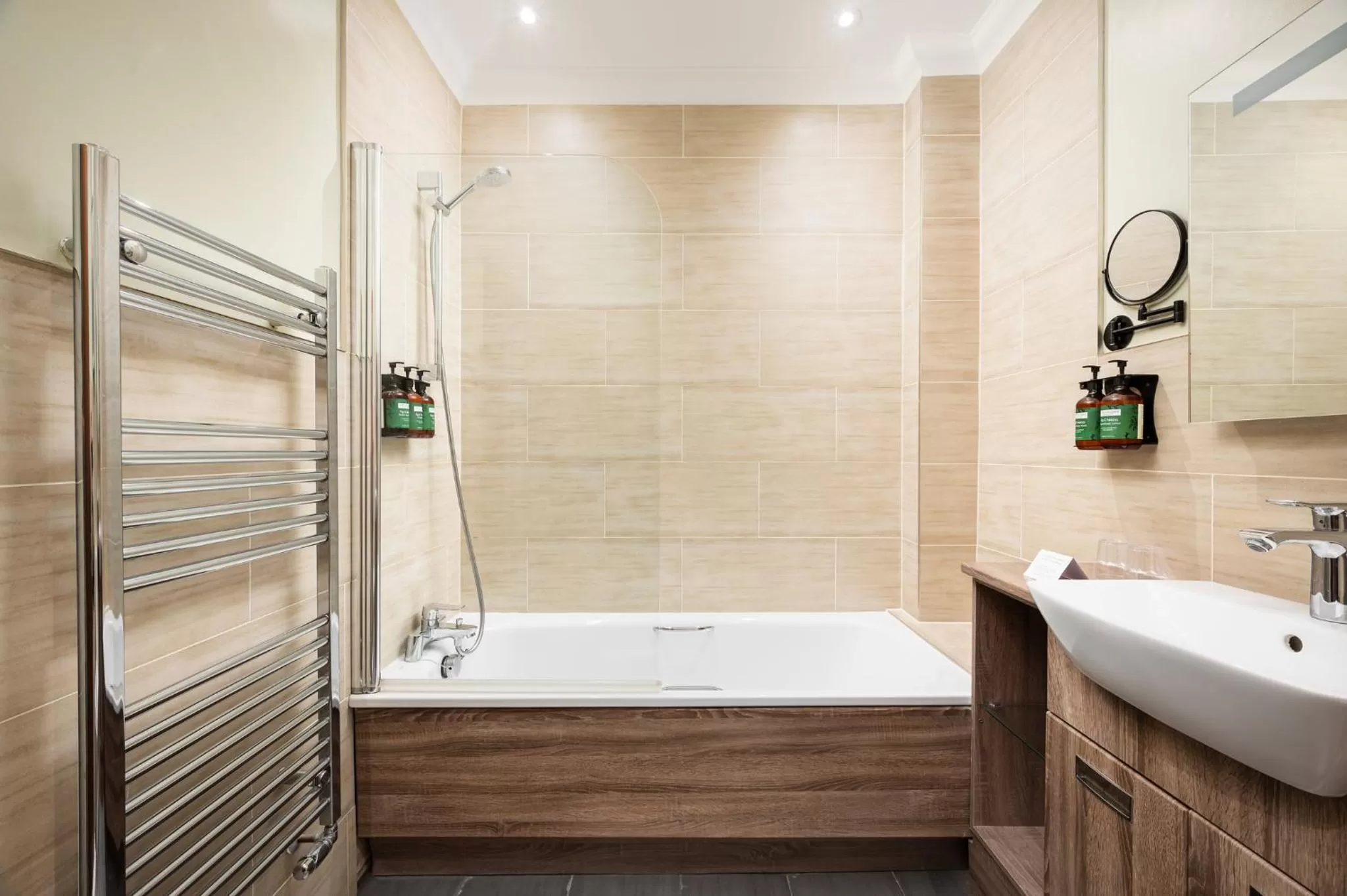 Bathroom in voco Lythe Hill Hotel & Spa by IHG