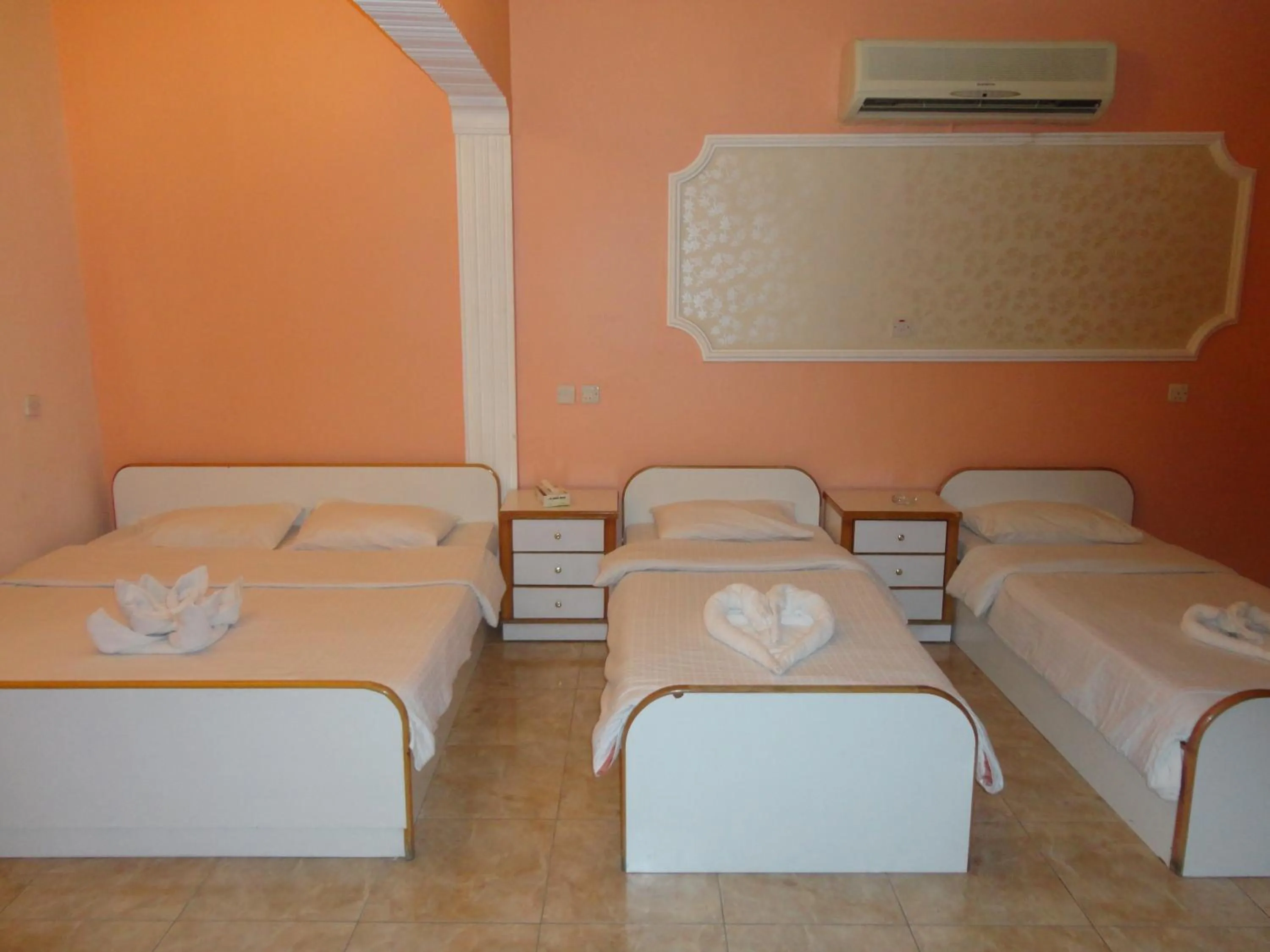 Bed in Al Qidra Hotel & Suites Aqaba