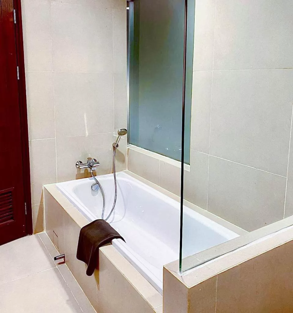 Bathroom in Harper Palembang by ASTON