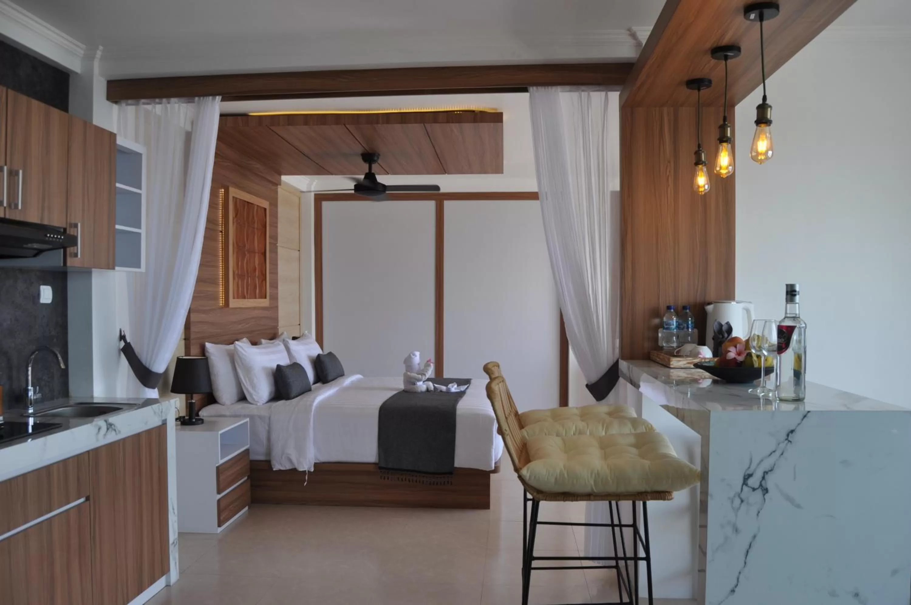 Coffee/tea facilities, Bed in SUITE OCEAN BLUE