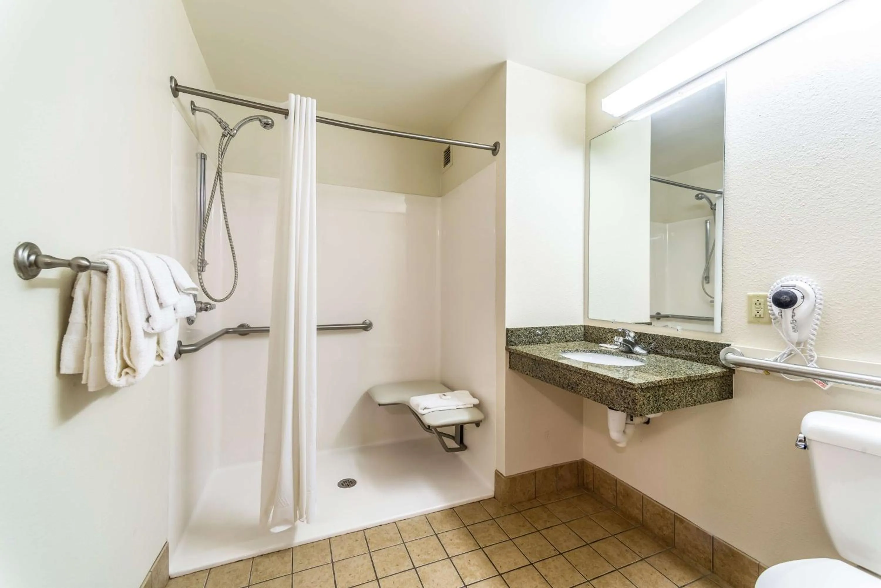 Shower in Welcome Suites-O'Fallon