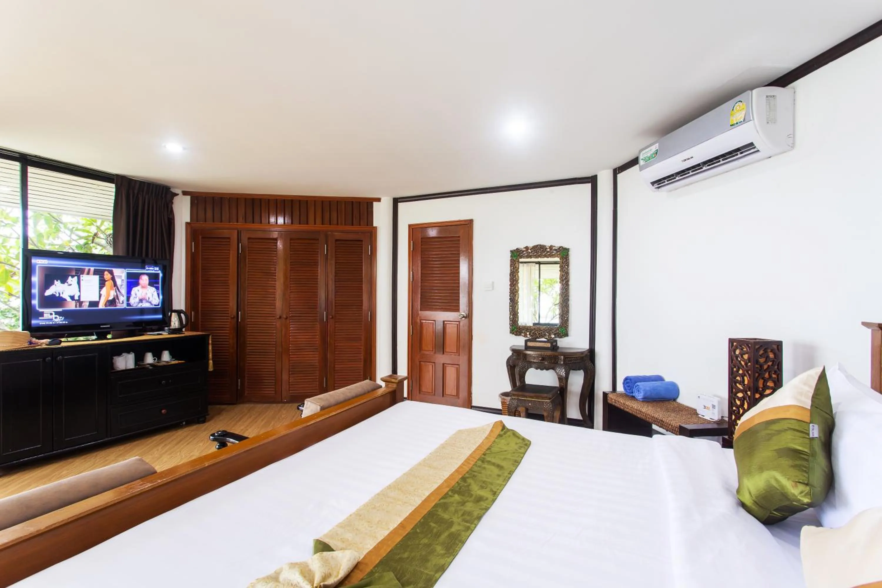 Bed in Rajapruek Samui Resort - SHA Plus