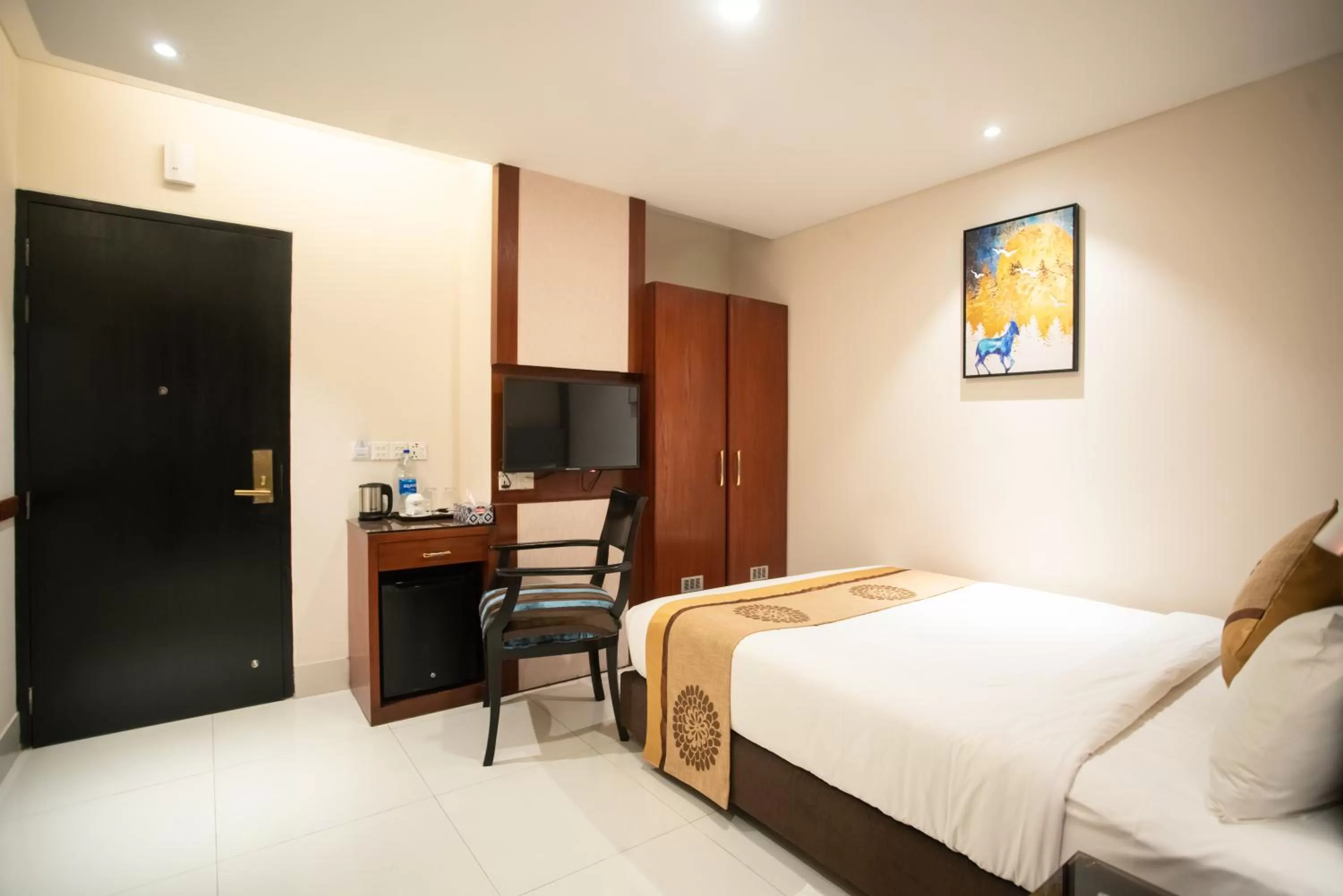 Bed in Jatra Hotel Grand Royal