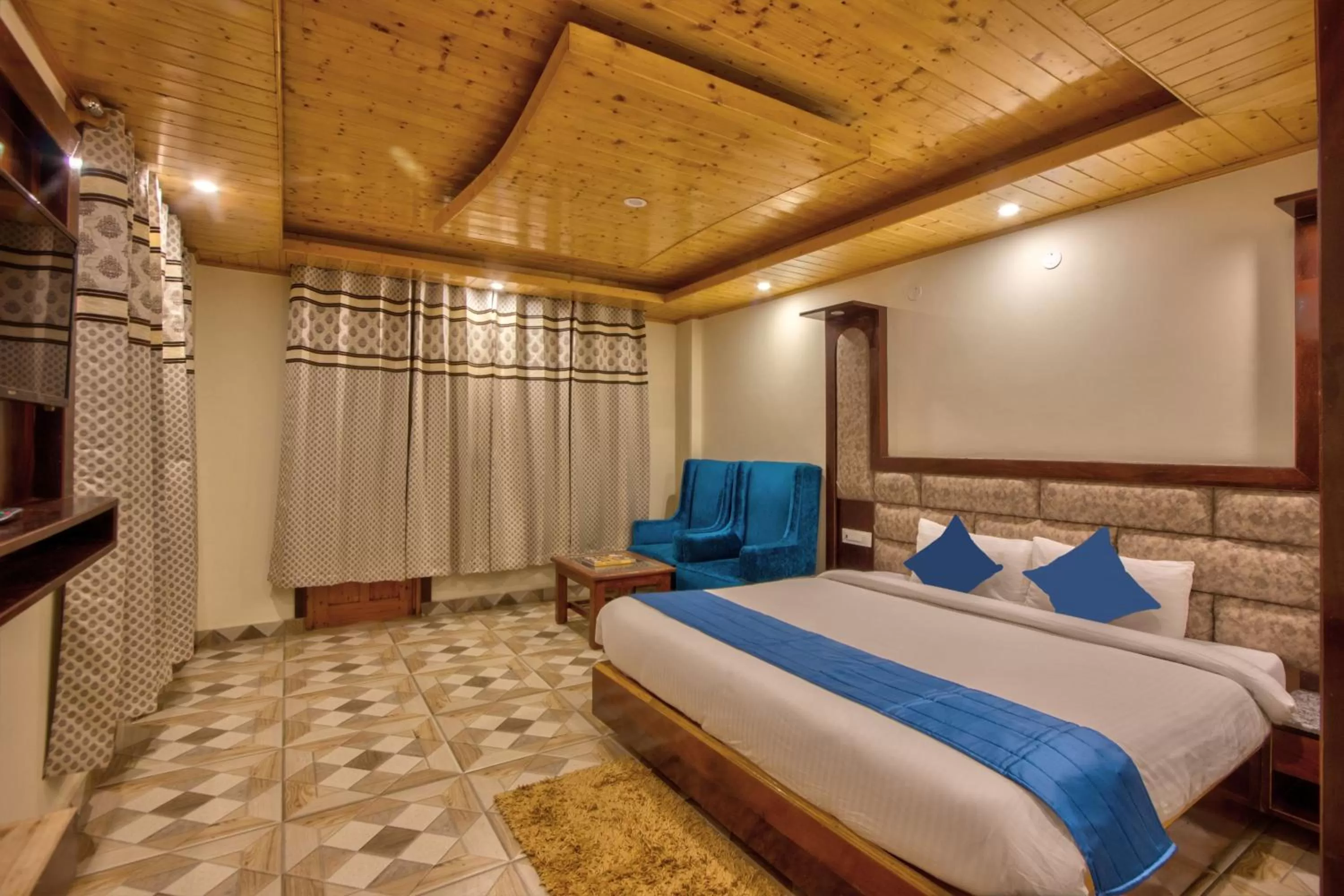 Photo of the whole room, Bed in Snow City's Montana Blues Resort Manali - Heated & Air-Cooled Stay