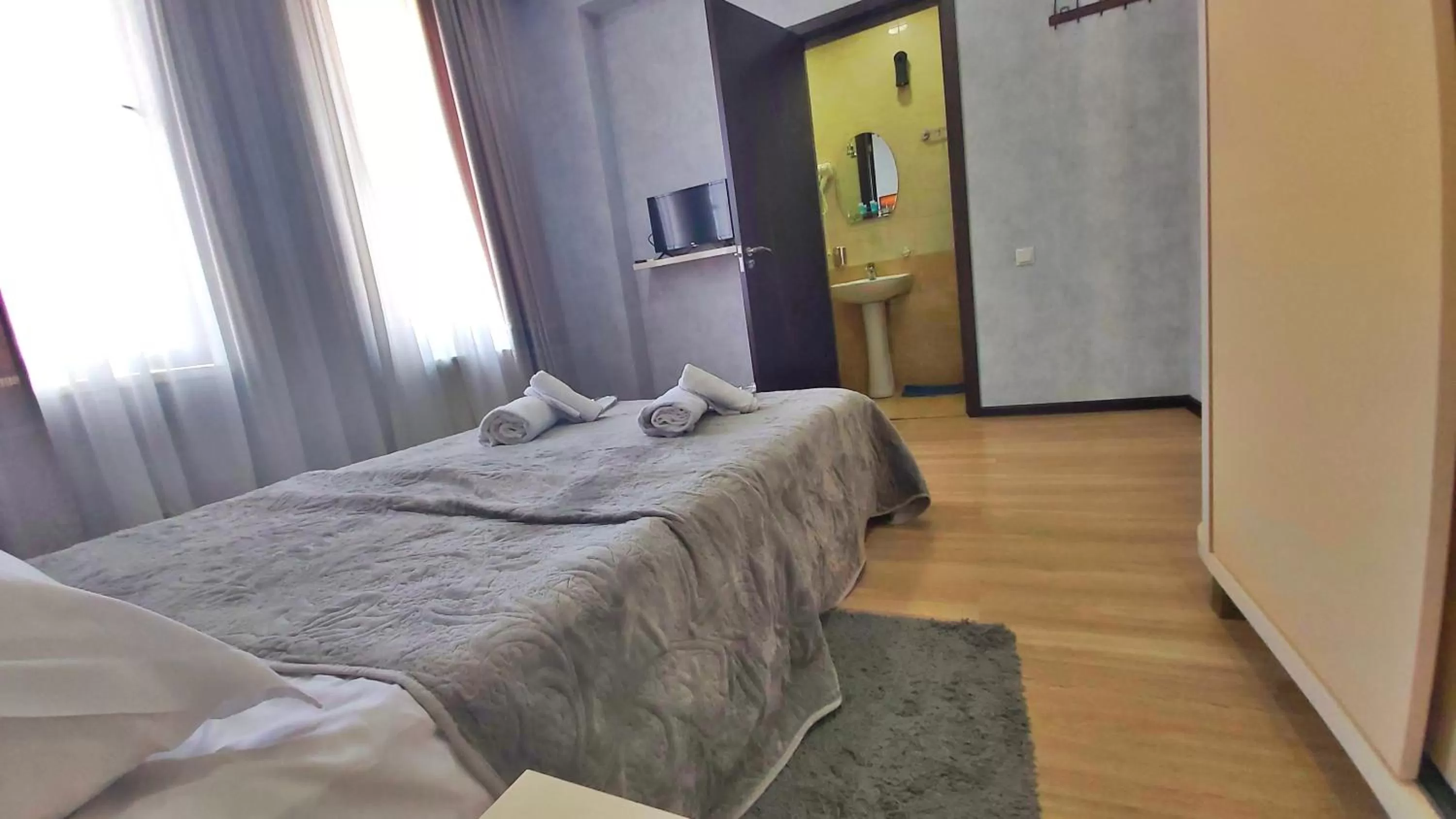 Bed in Gamarjoba Hotel