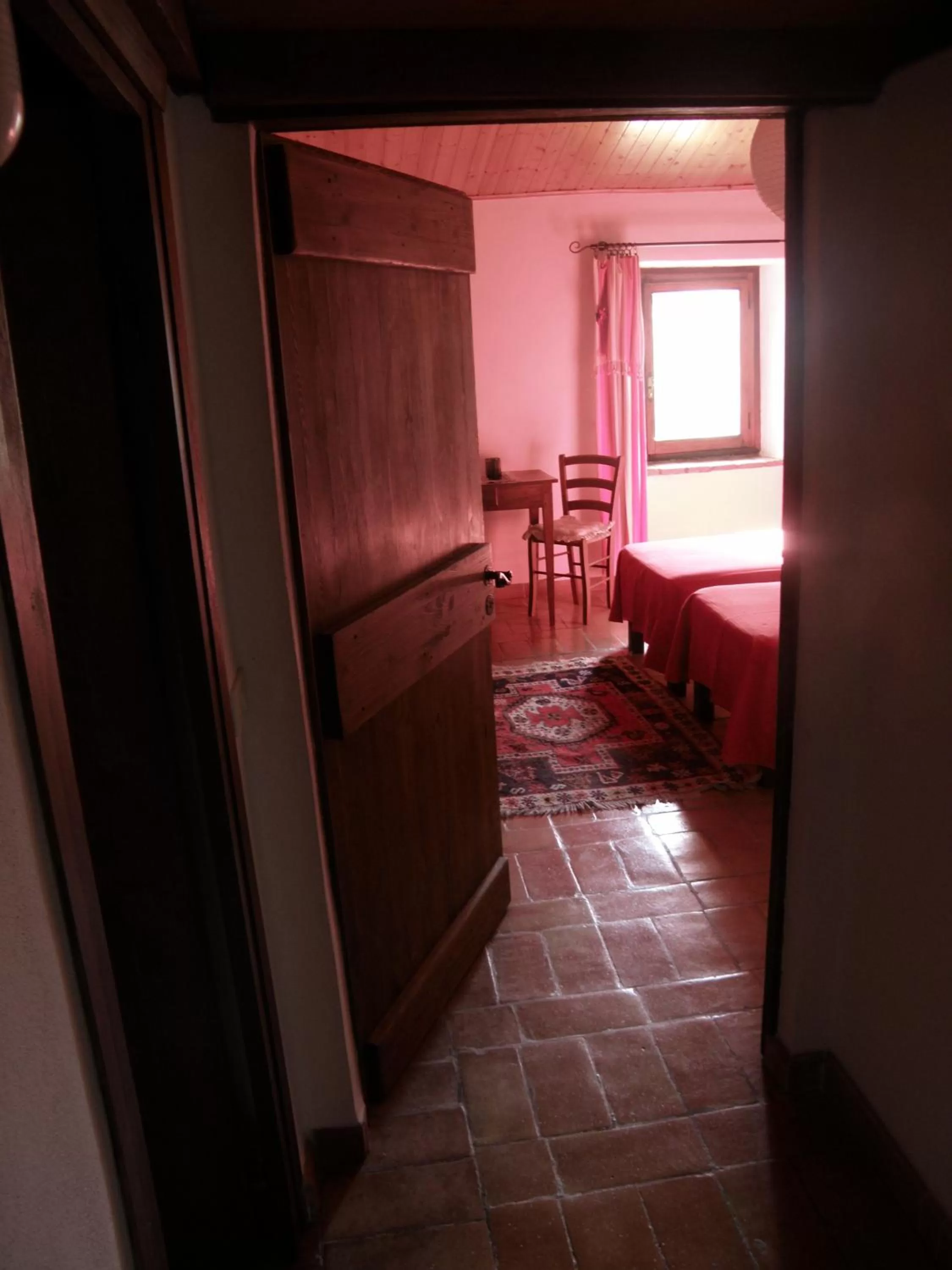 Decorative detail, Bed in Podere Pinzicalari