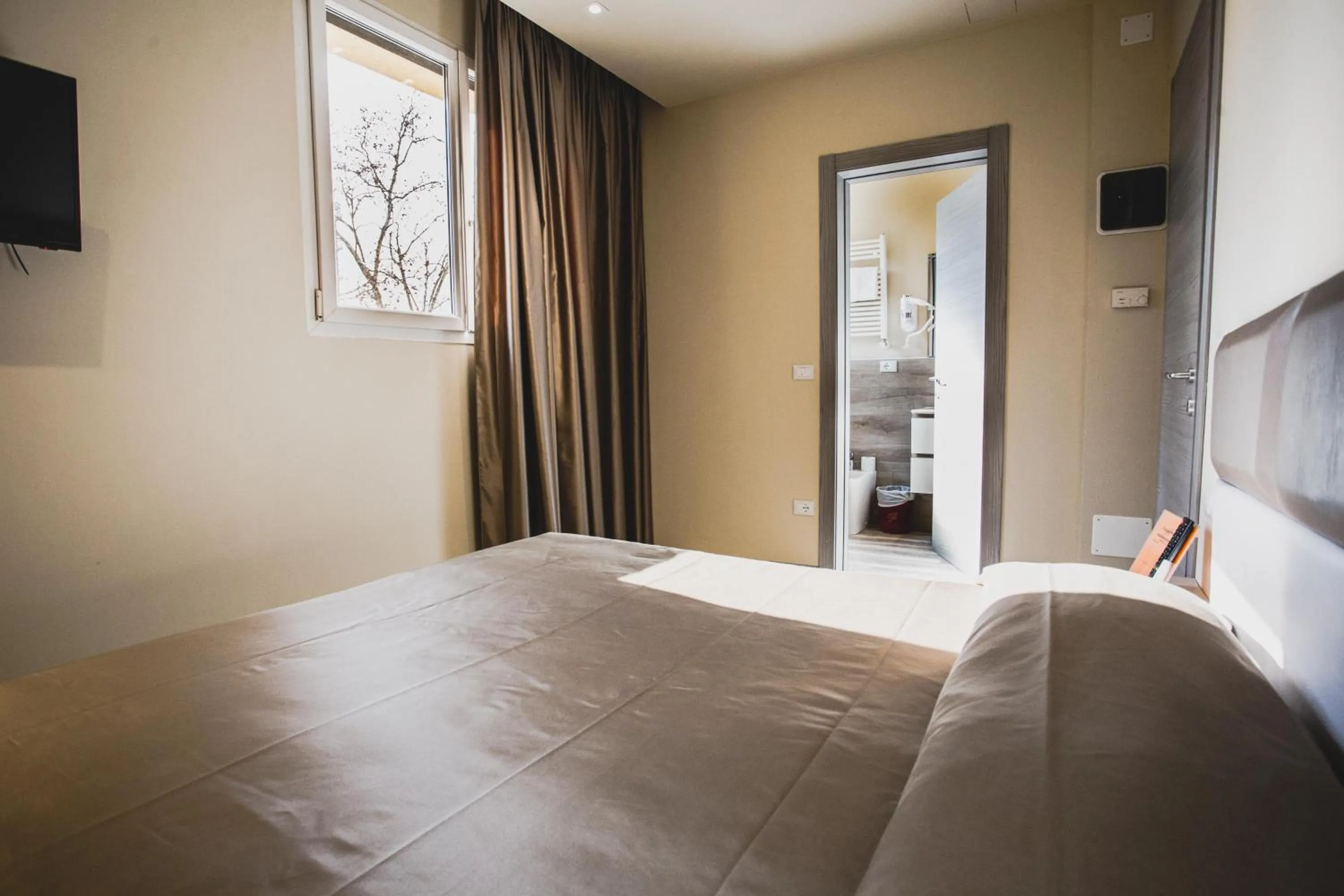 Bed in Hotel Fiera Wellness & Spa