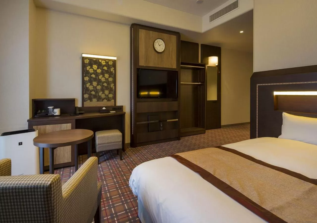 Photo of the whole room, Bed in Hotel Monterey Fukuoka