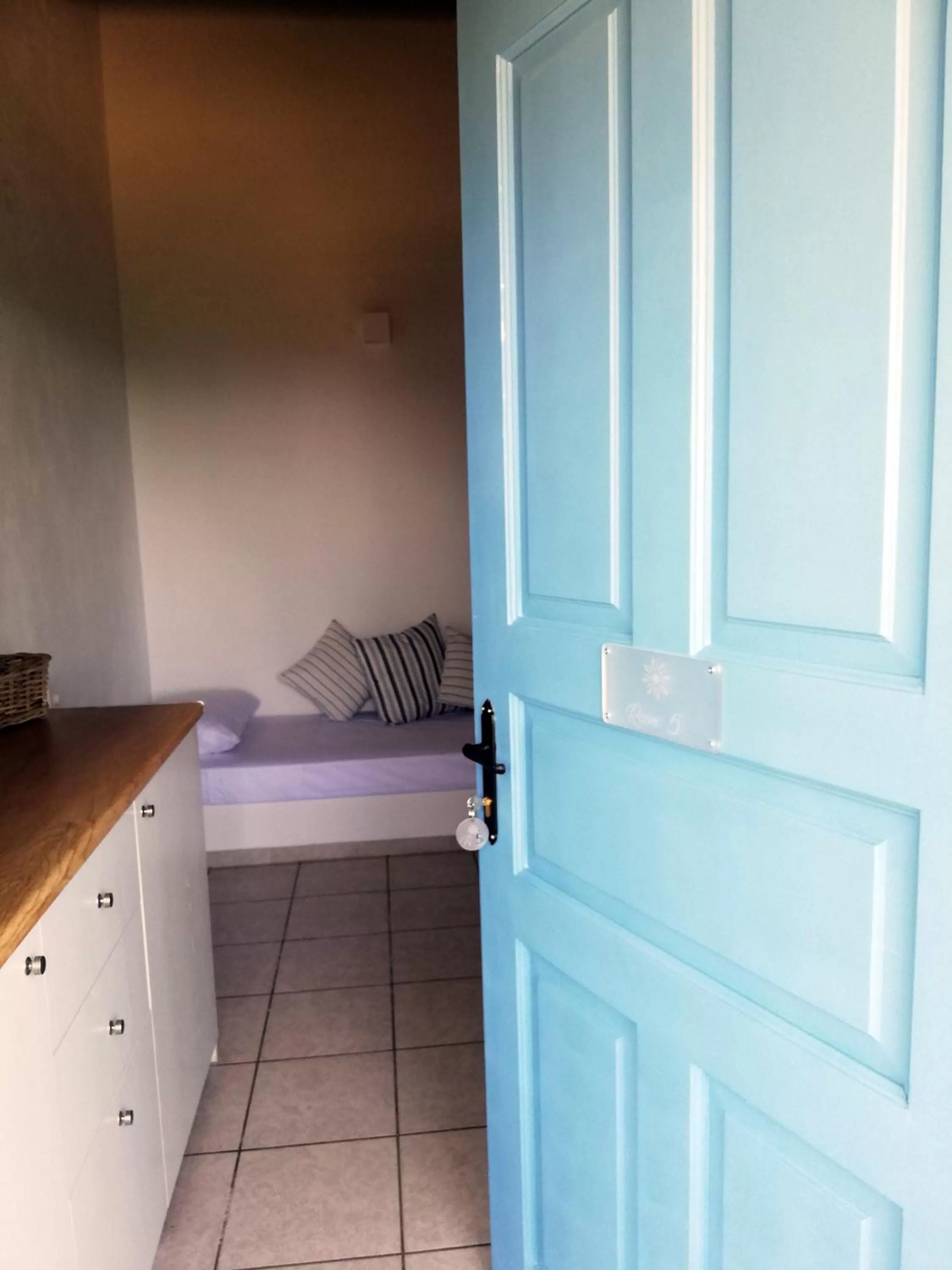 Bedroom in Rigas Rooms