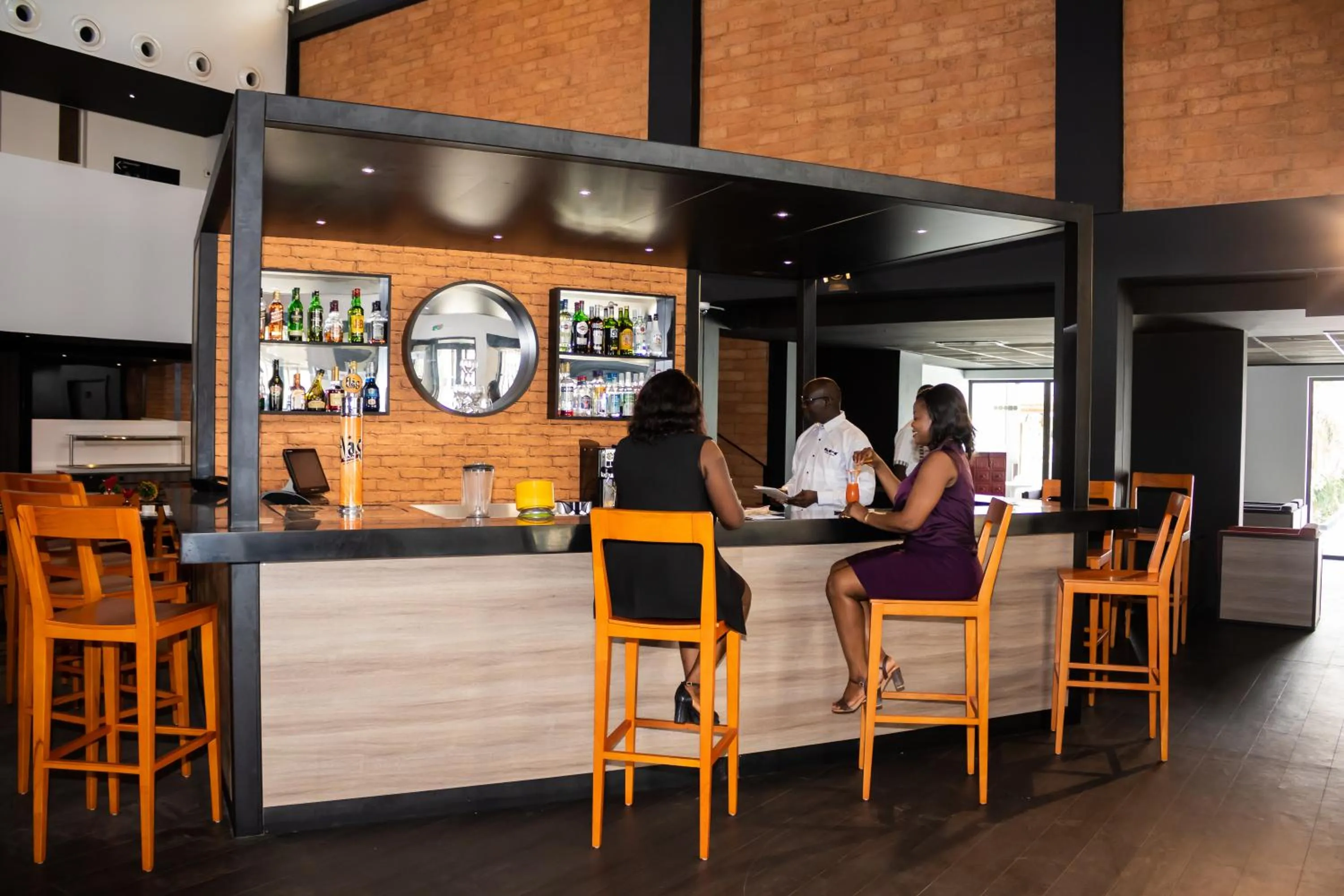 Lounge or bar in ONOMO Hotel Dakar