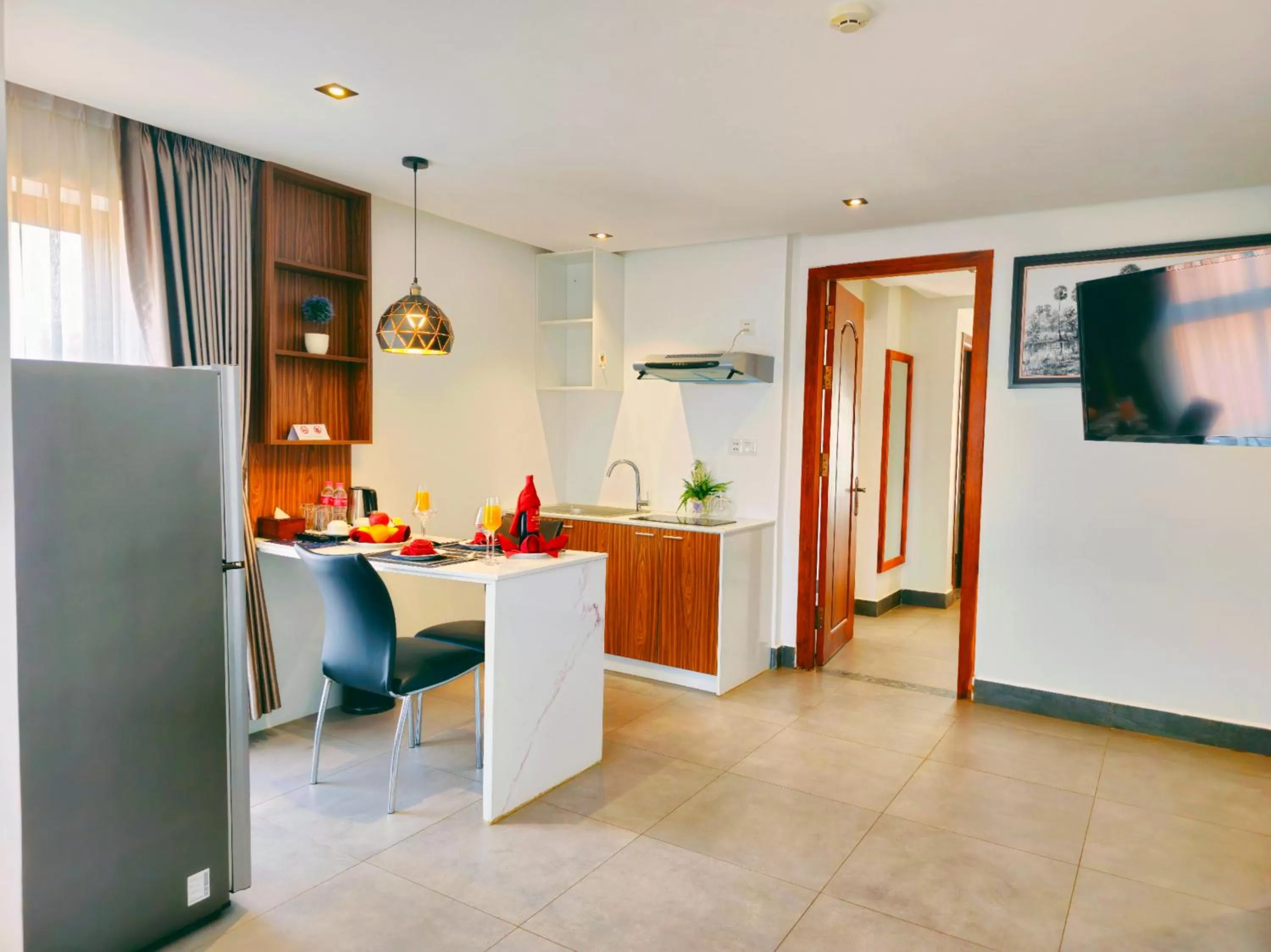 Kitchen or kitchenette in Le Botum Hotel