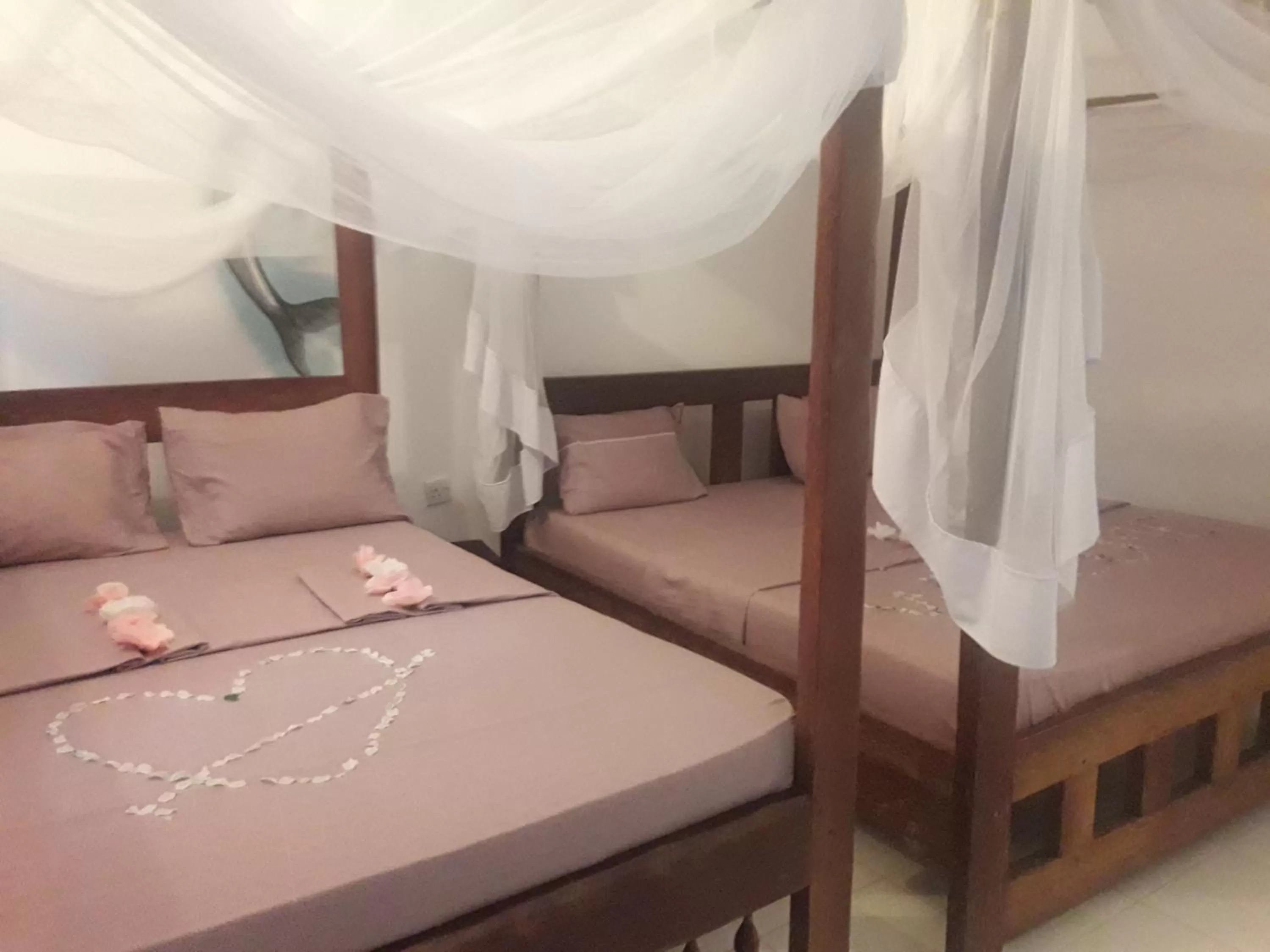 Photo of the whole room, Bed in Ebony & Ivory Beach Bungalows