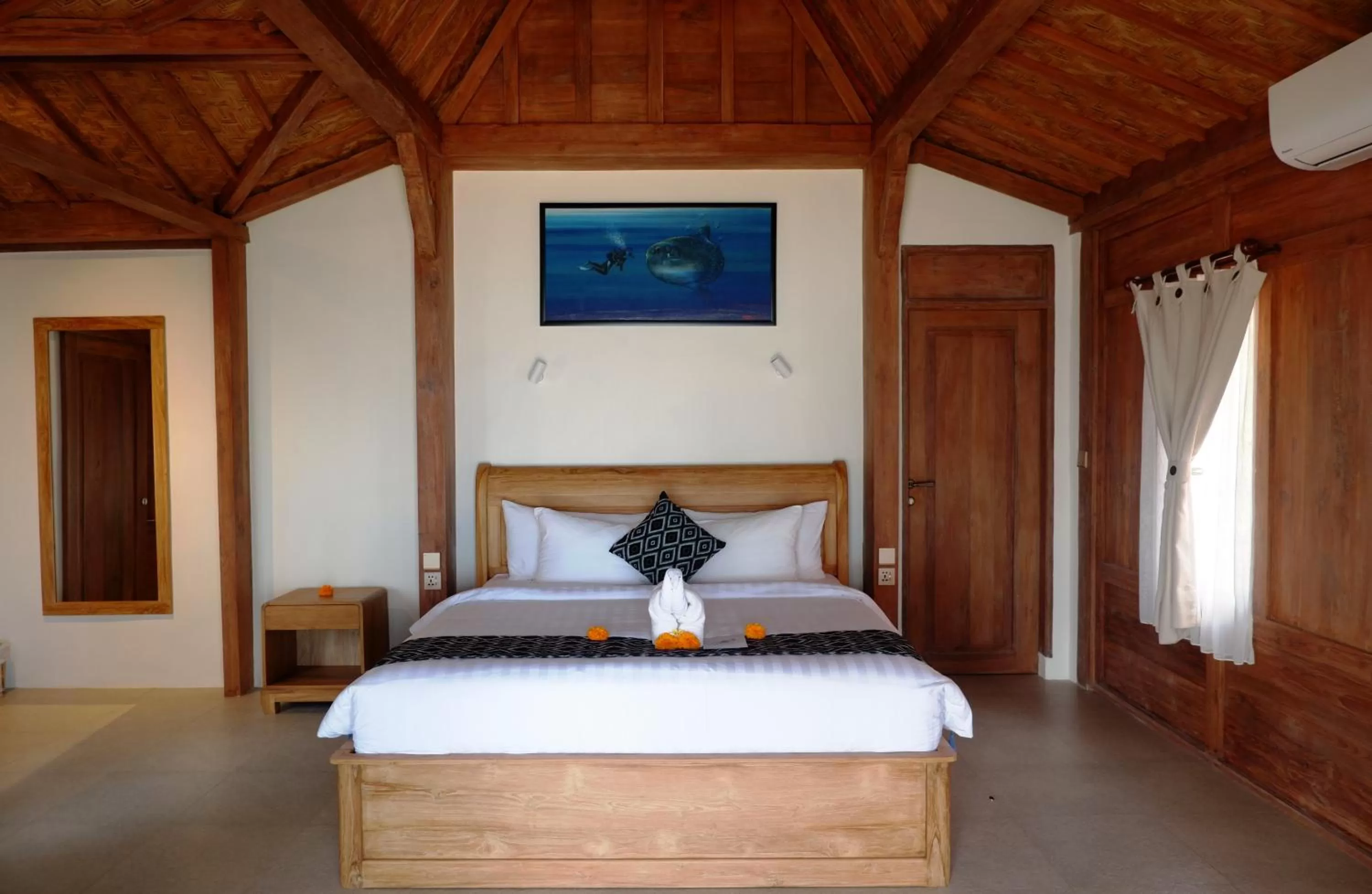 Property building, Bed in Blue Harbor Beachfront Villas & Resto