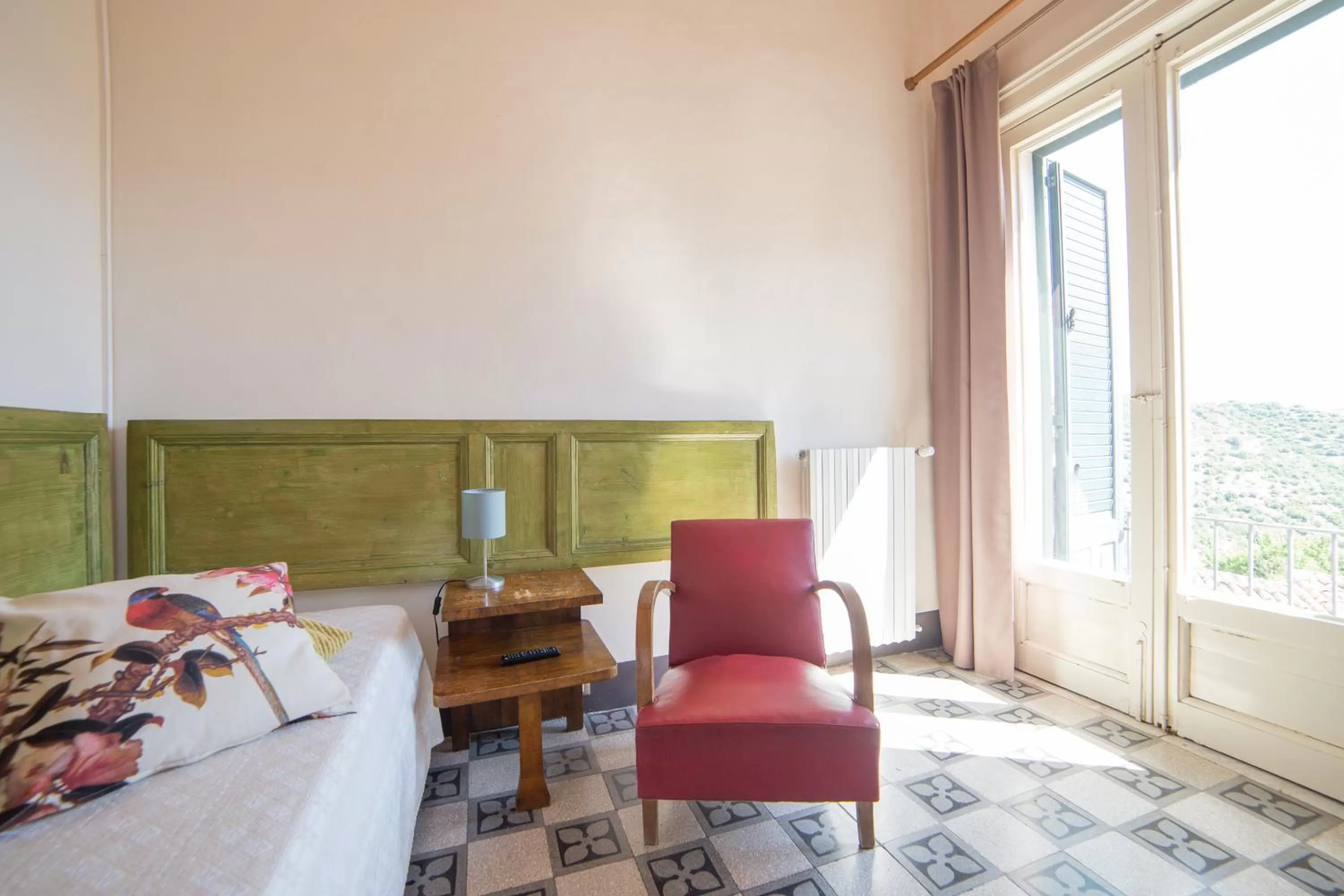 Seating area, Bed in B&B Giardino Di Pietra