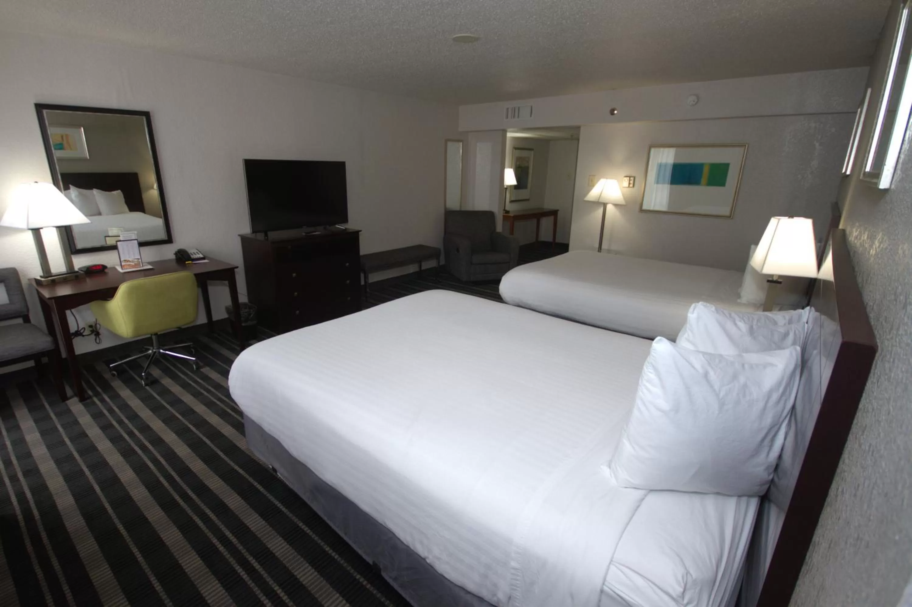 Bedroom, Bed in Atrium Hotel and Suites DFW Airport