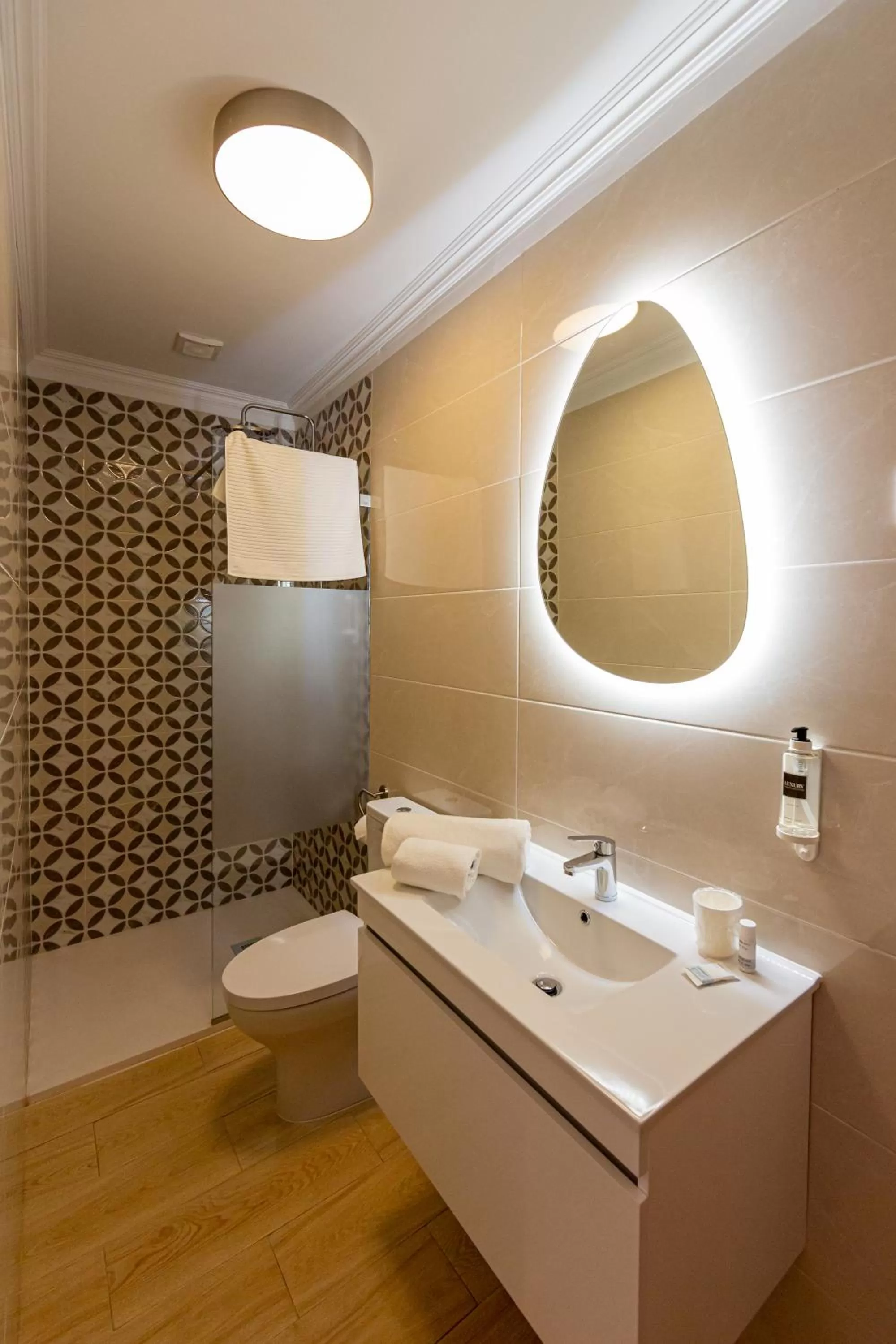 Shower, Bathroom in Luxury Palm Suites