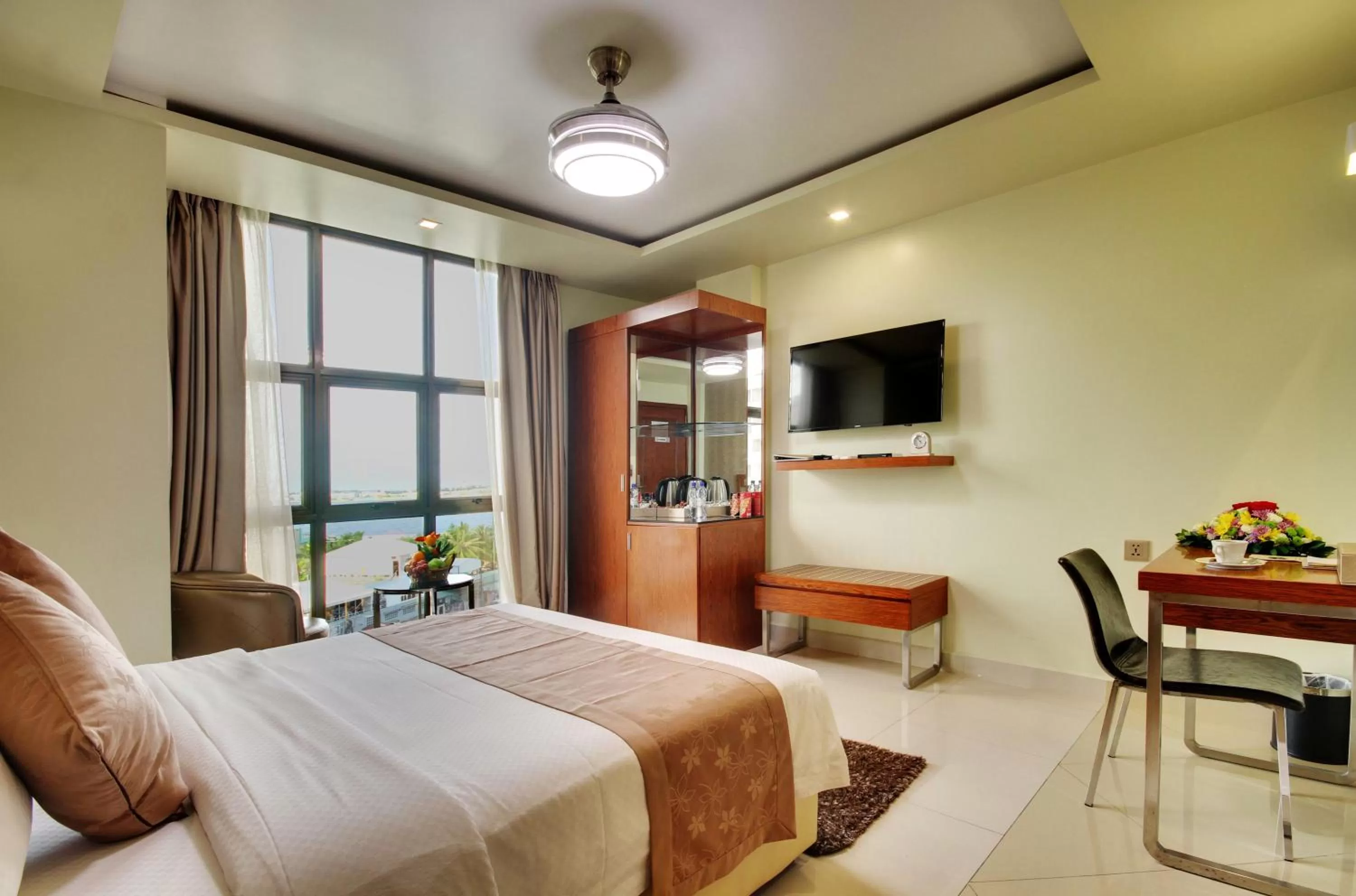 Photo of the whole room, Bed in Unima Grand