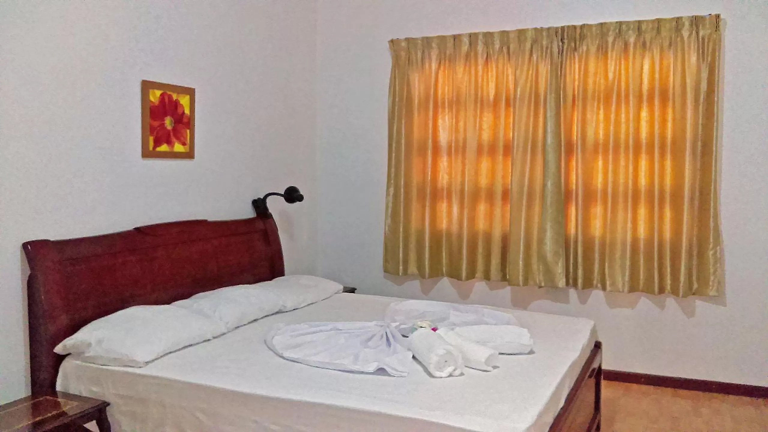 Bed in Joah Inn Appartementen